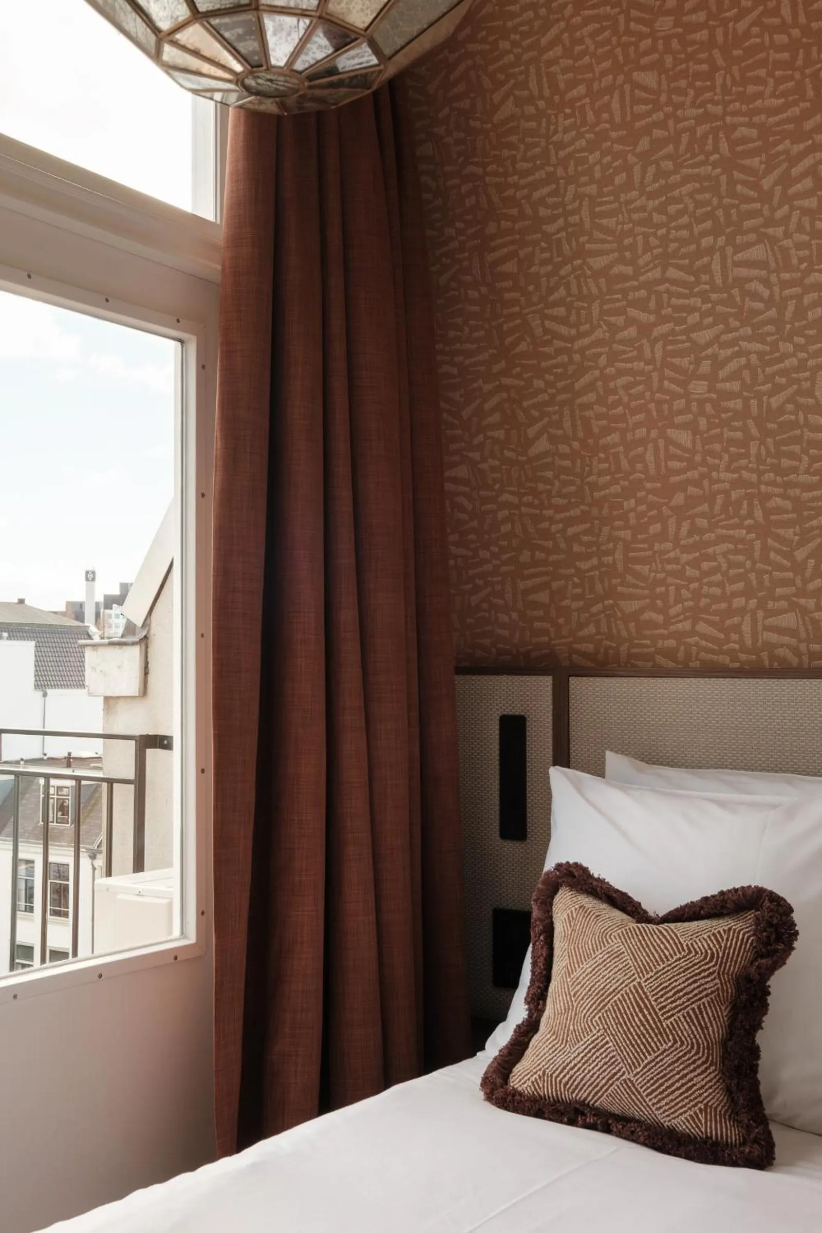 Bed in Parklane Hotel