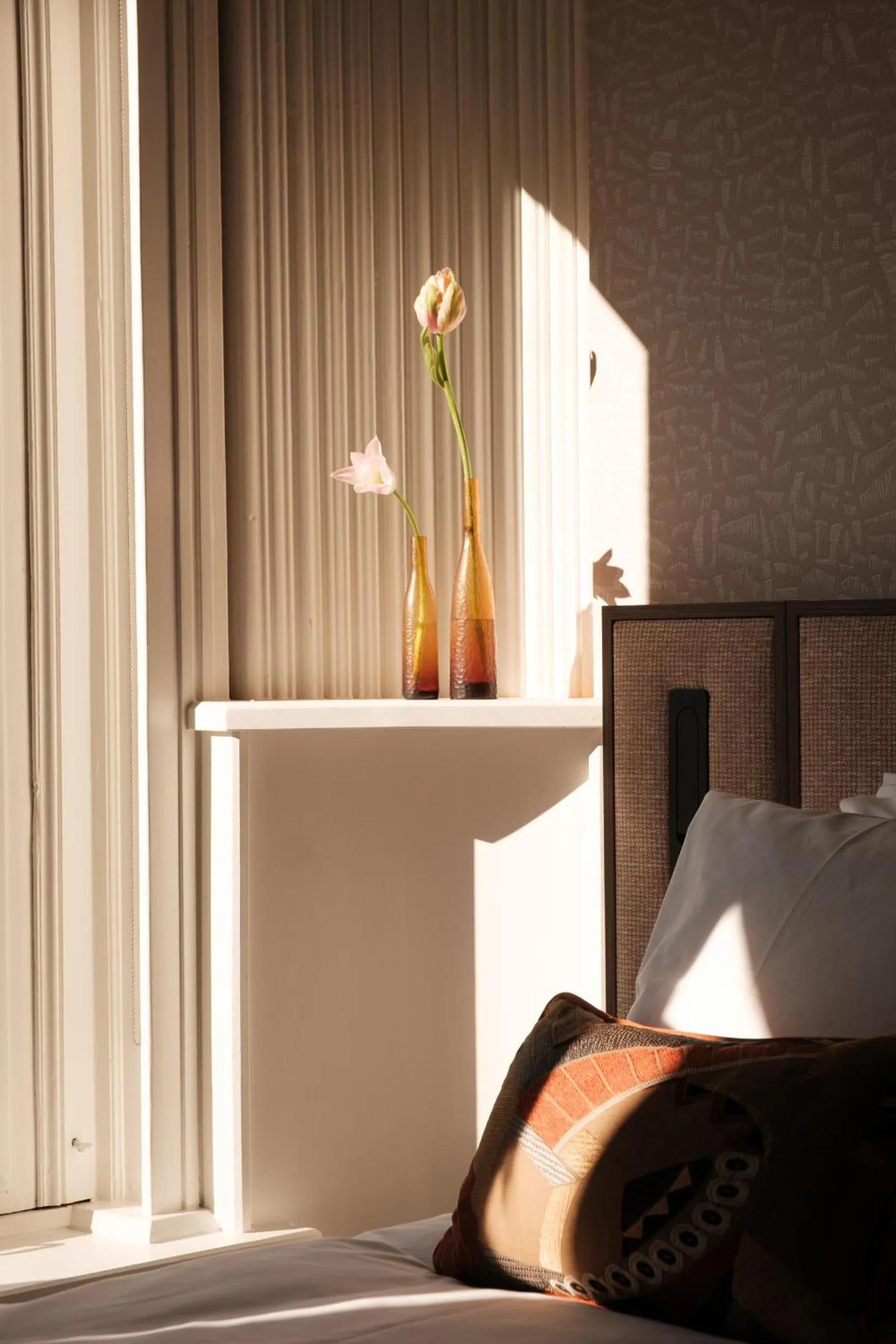 Bed in Parklane Hotel