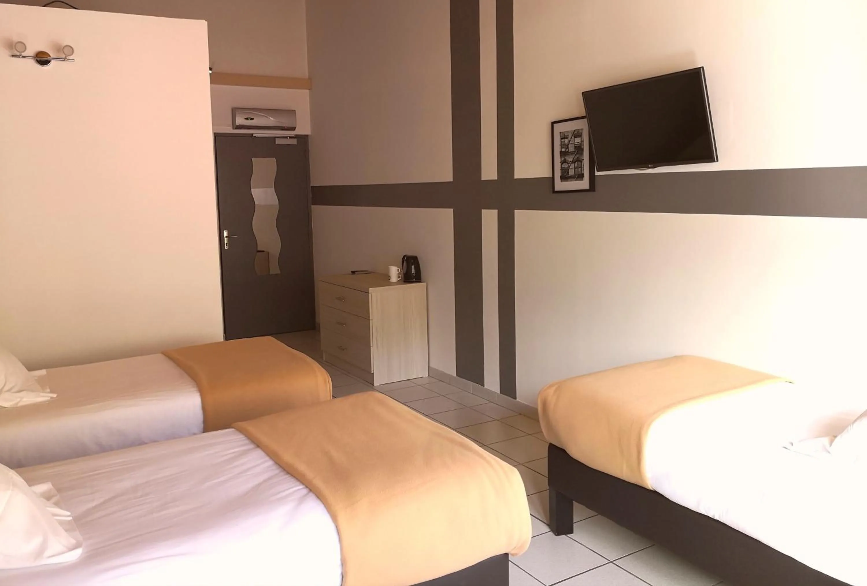 Bed in Hôtel Les Sources