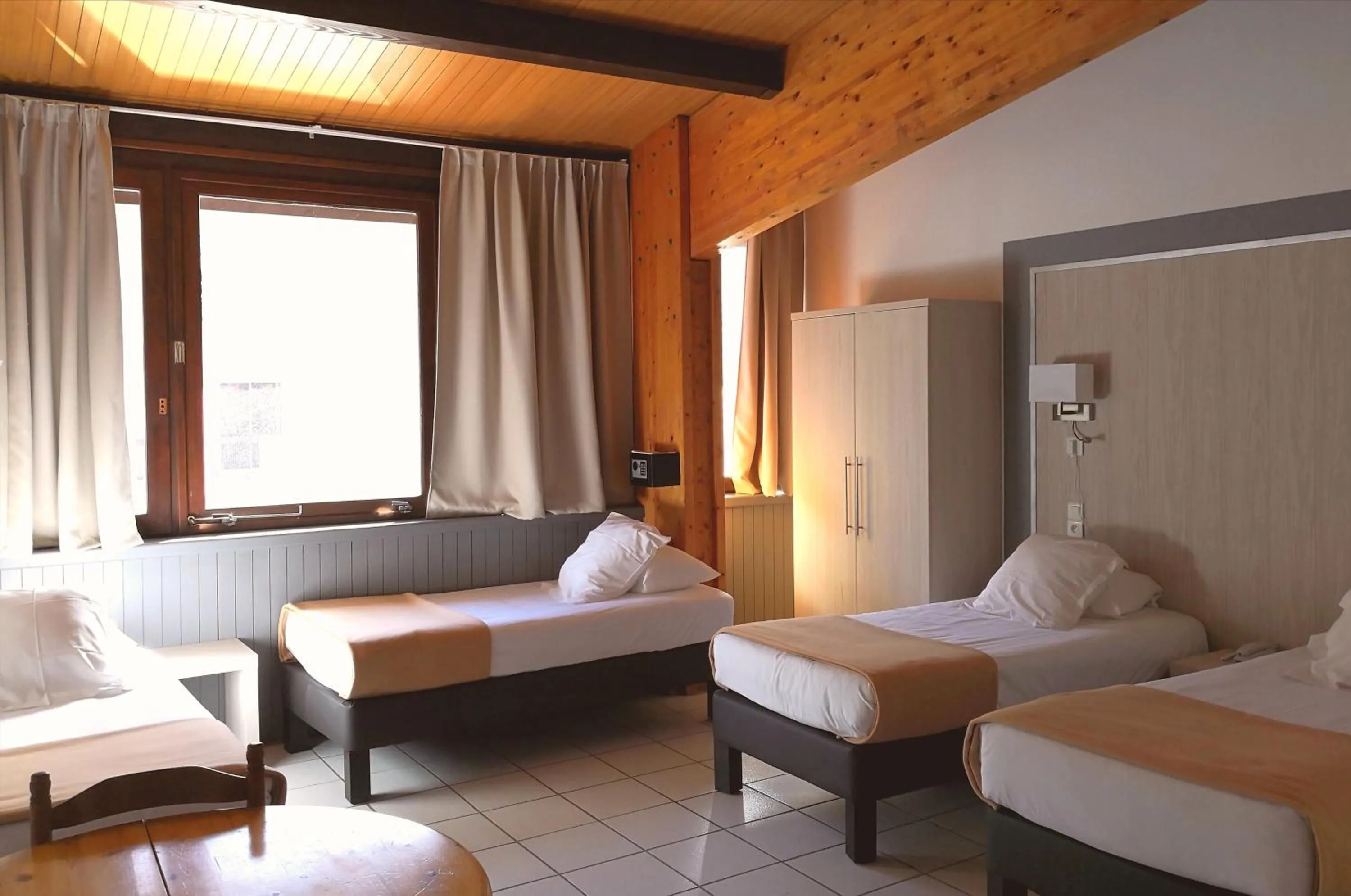 Bed in Hôtel Les Sources