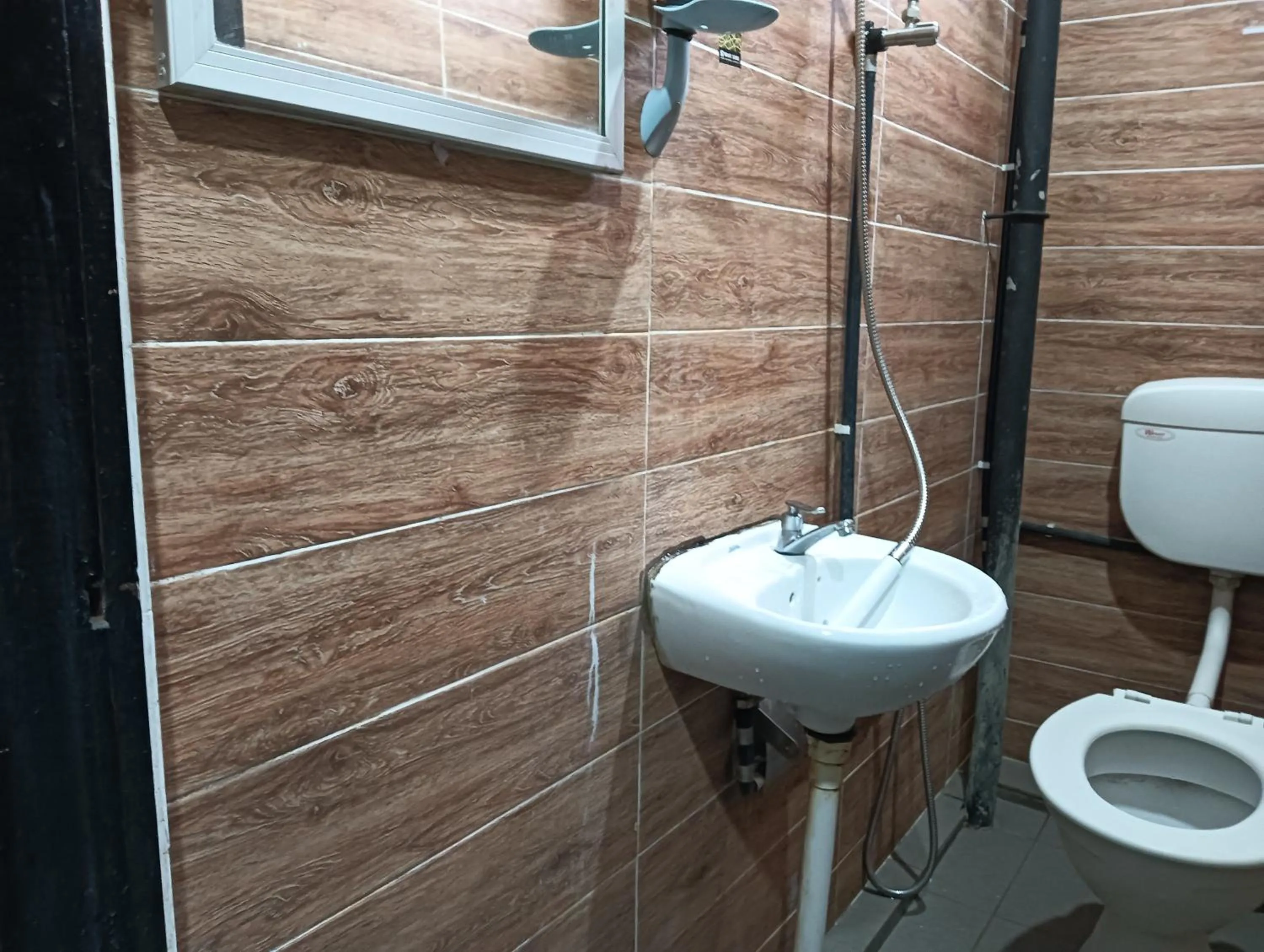 Bathroom in Hotel O Hi Inn 2