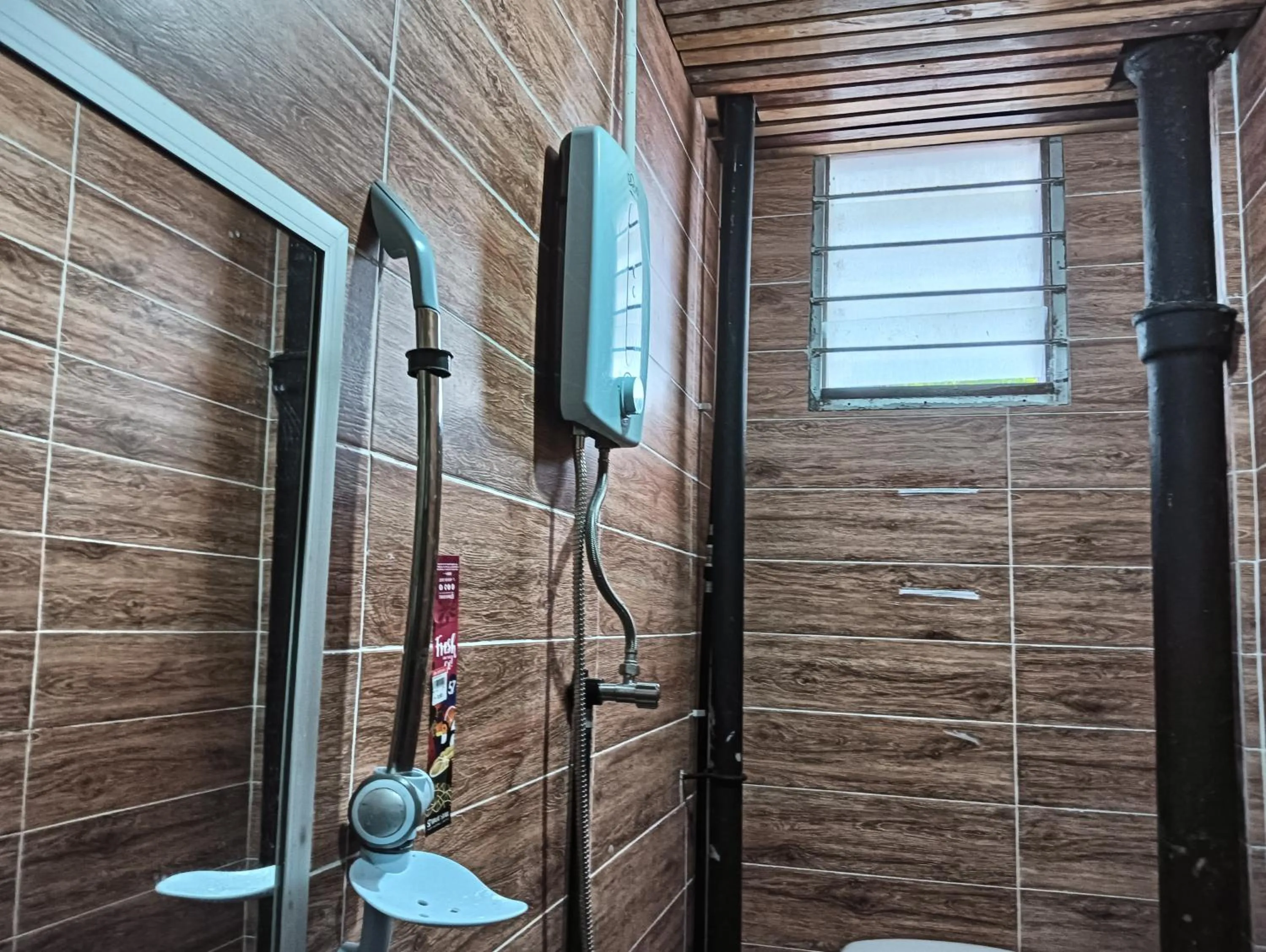 Bathroom in Hotel O Hi Inn 2