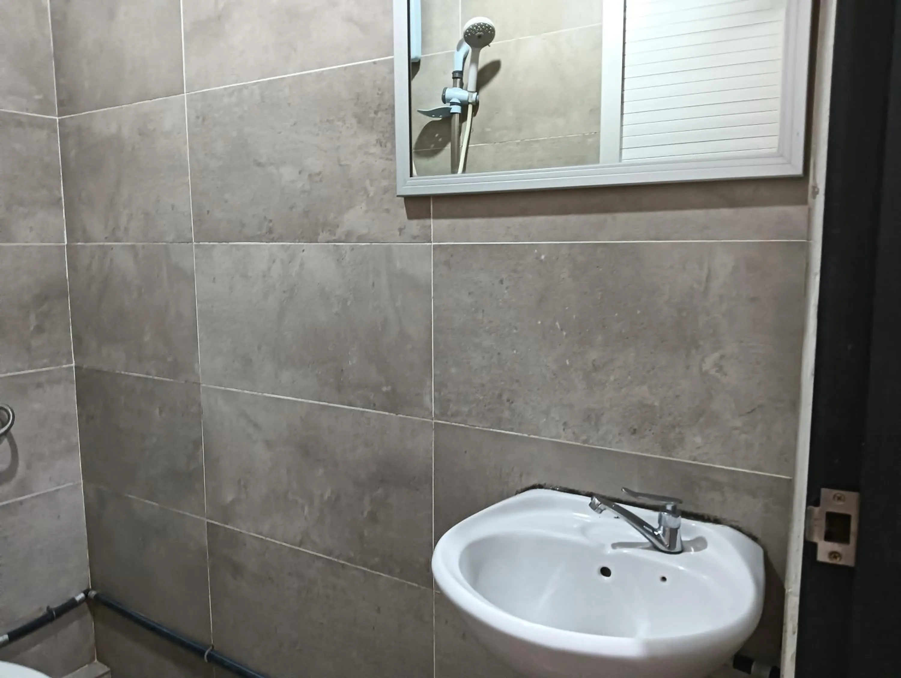 Bathroom in Hotel O Hi Inn 2