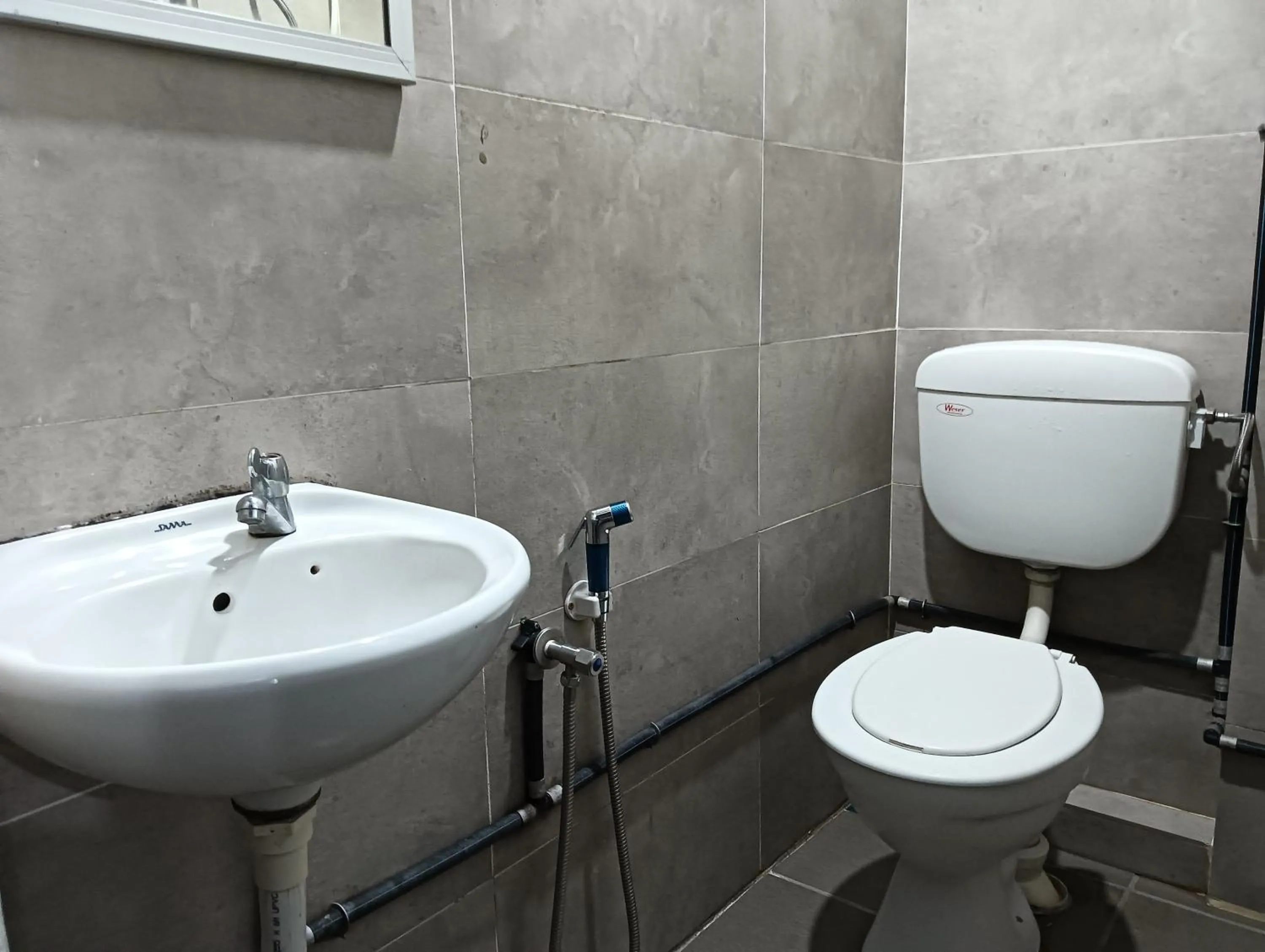 Bathroom in Hotel O Hi Inn 2