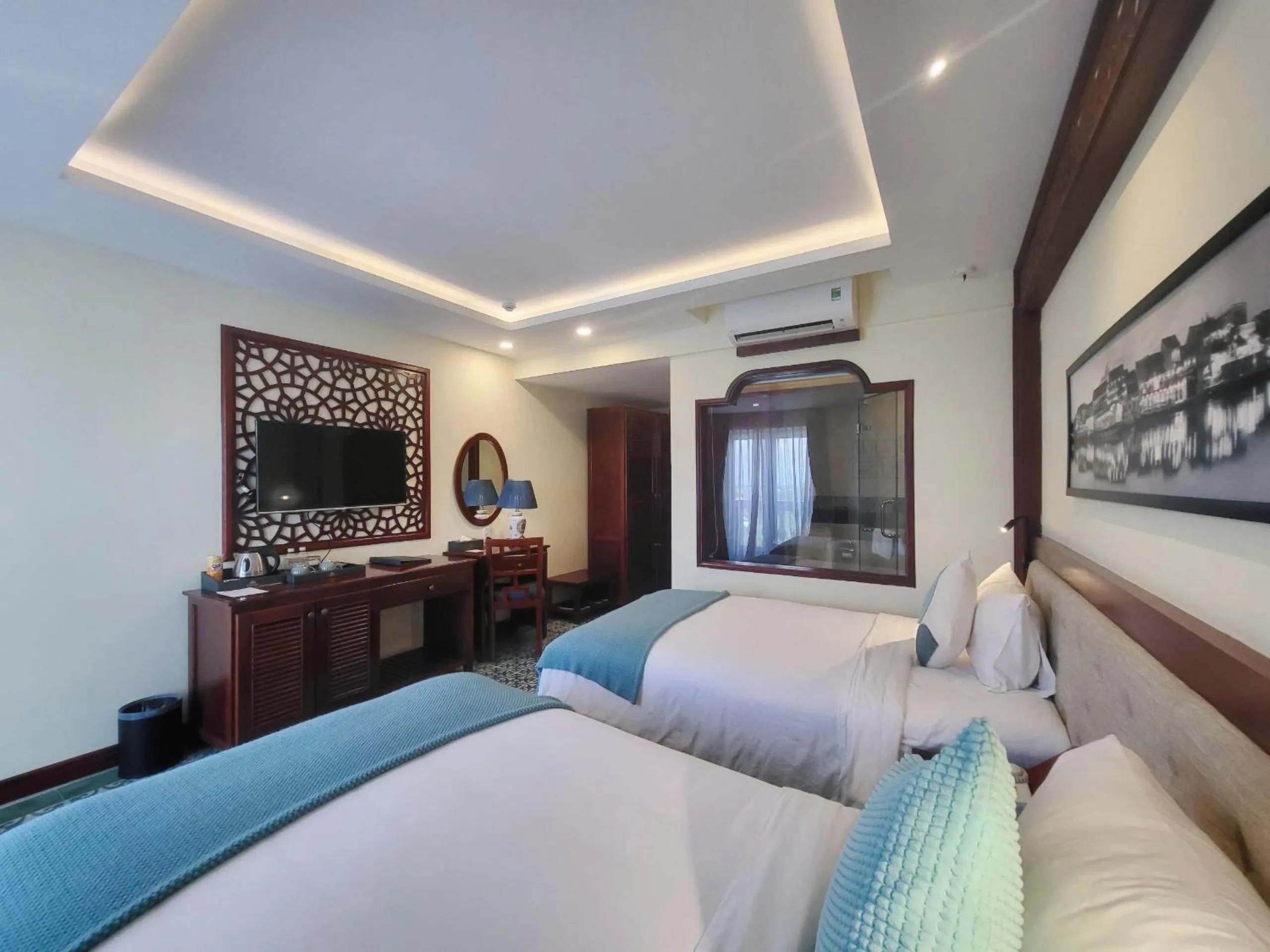 Communal lounge/ TV room, Bed in My Son Boutique Hotel & Spa Hoi An