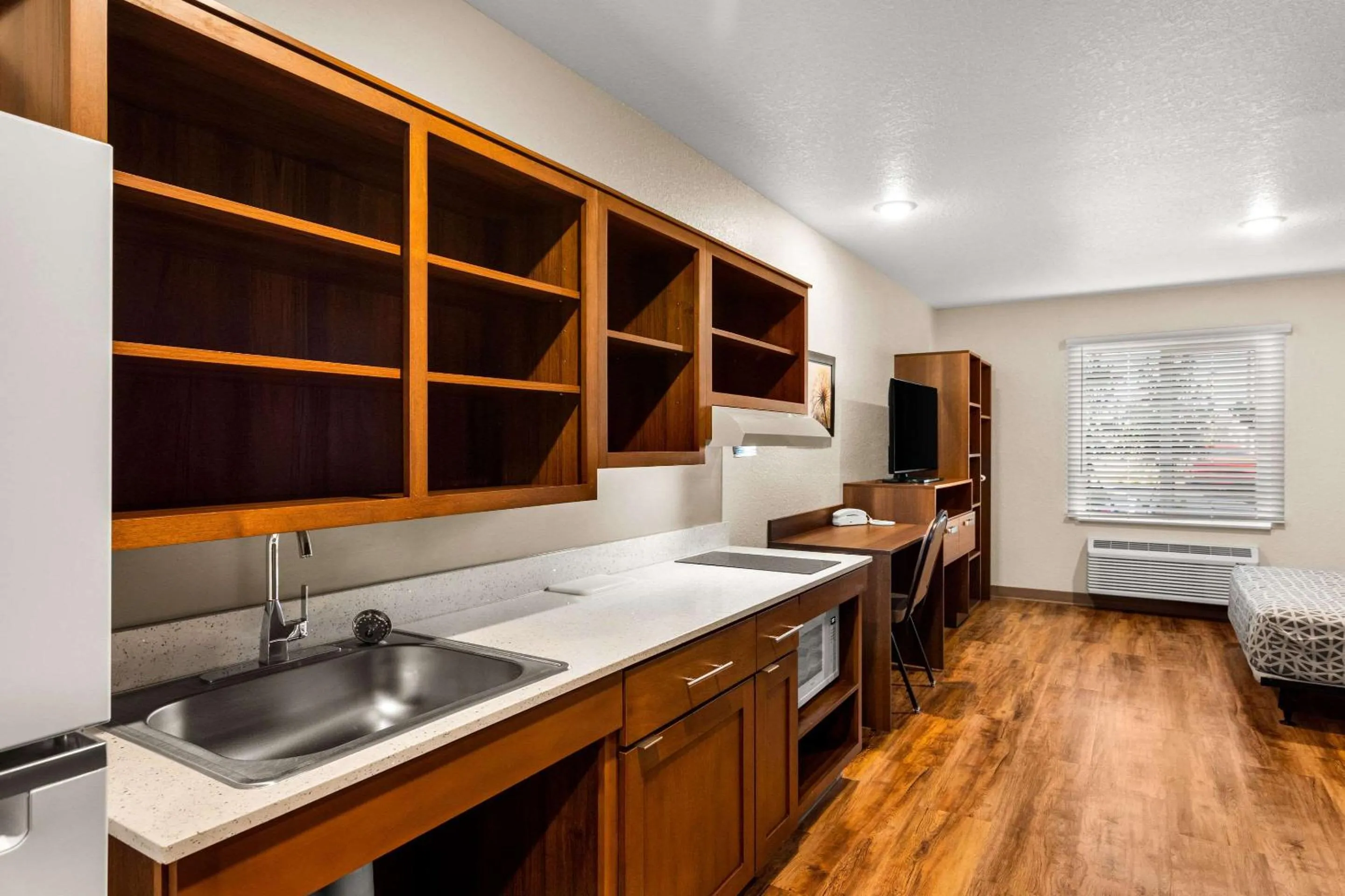 Bedroom in WoodSpring Suites Port St Lucie