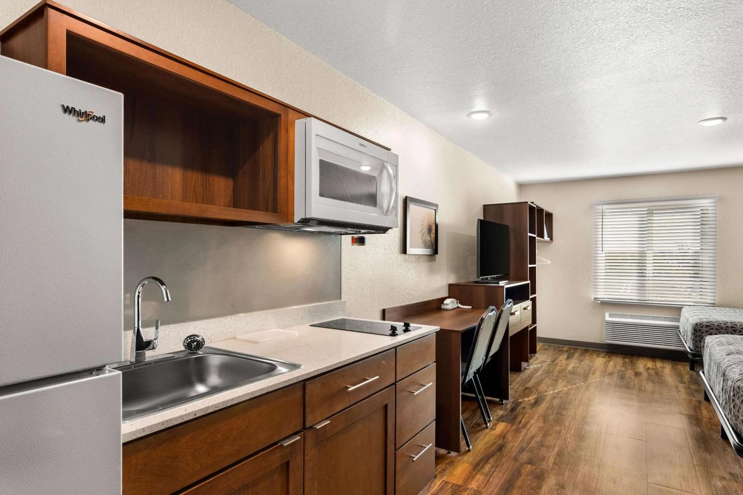 Bedroom in WoodSpring Suites Port St Lucie