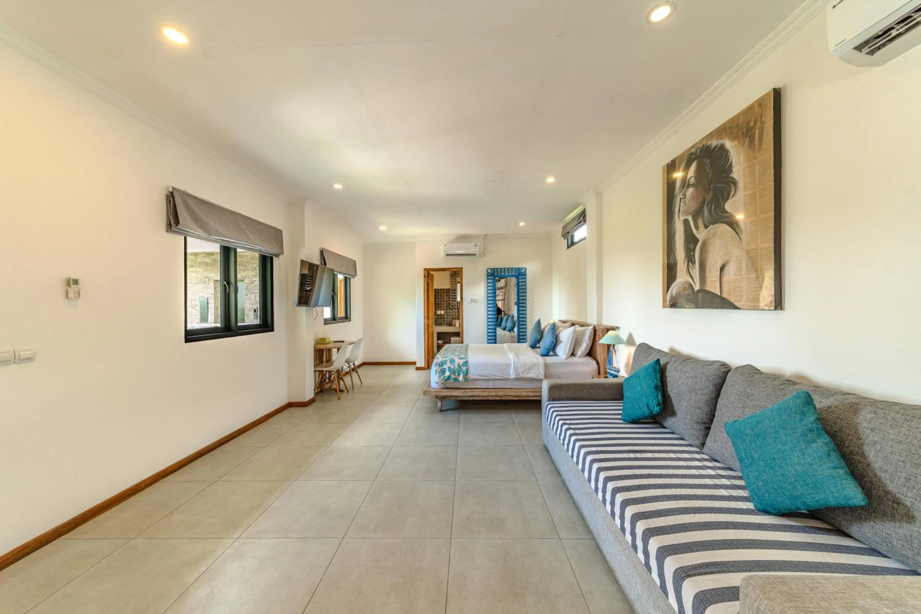 Bed in Komodo Suites Downtown