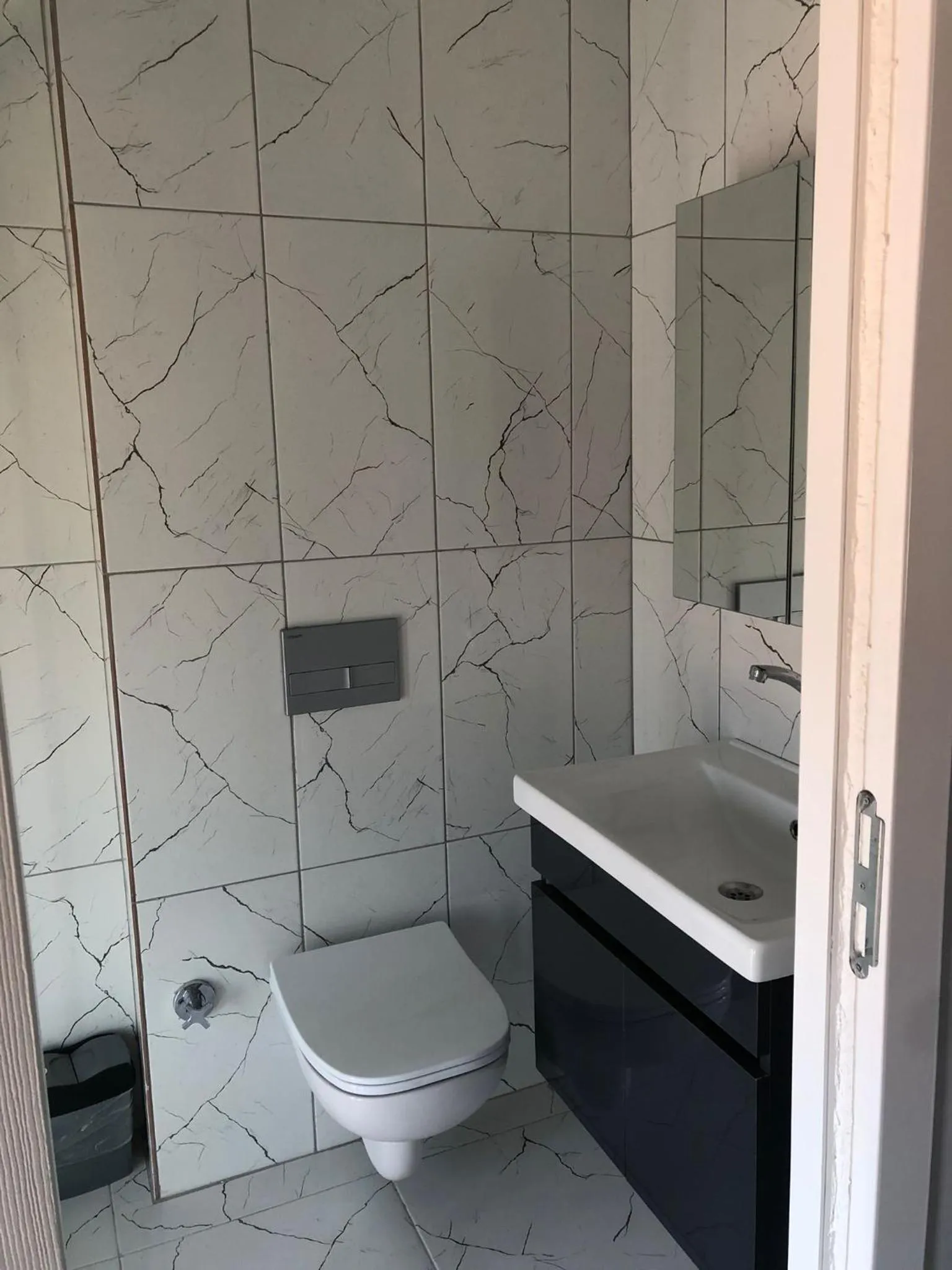 Shower in RED FLAG HOTEL