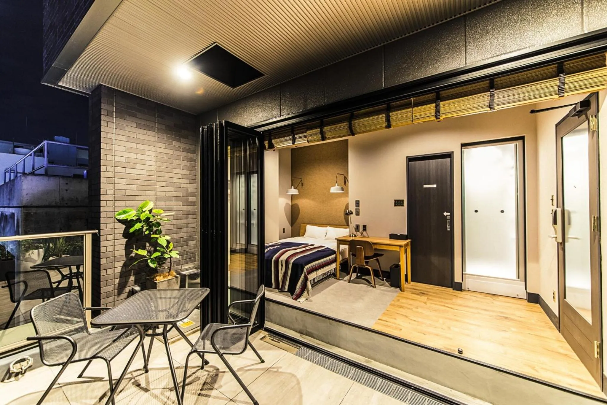 Living room, Bed in H HOTEL