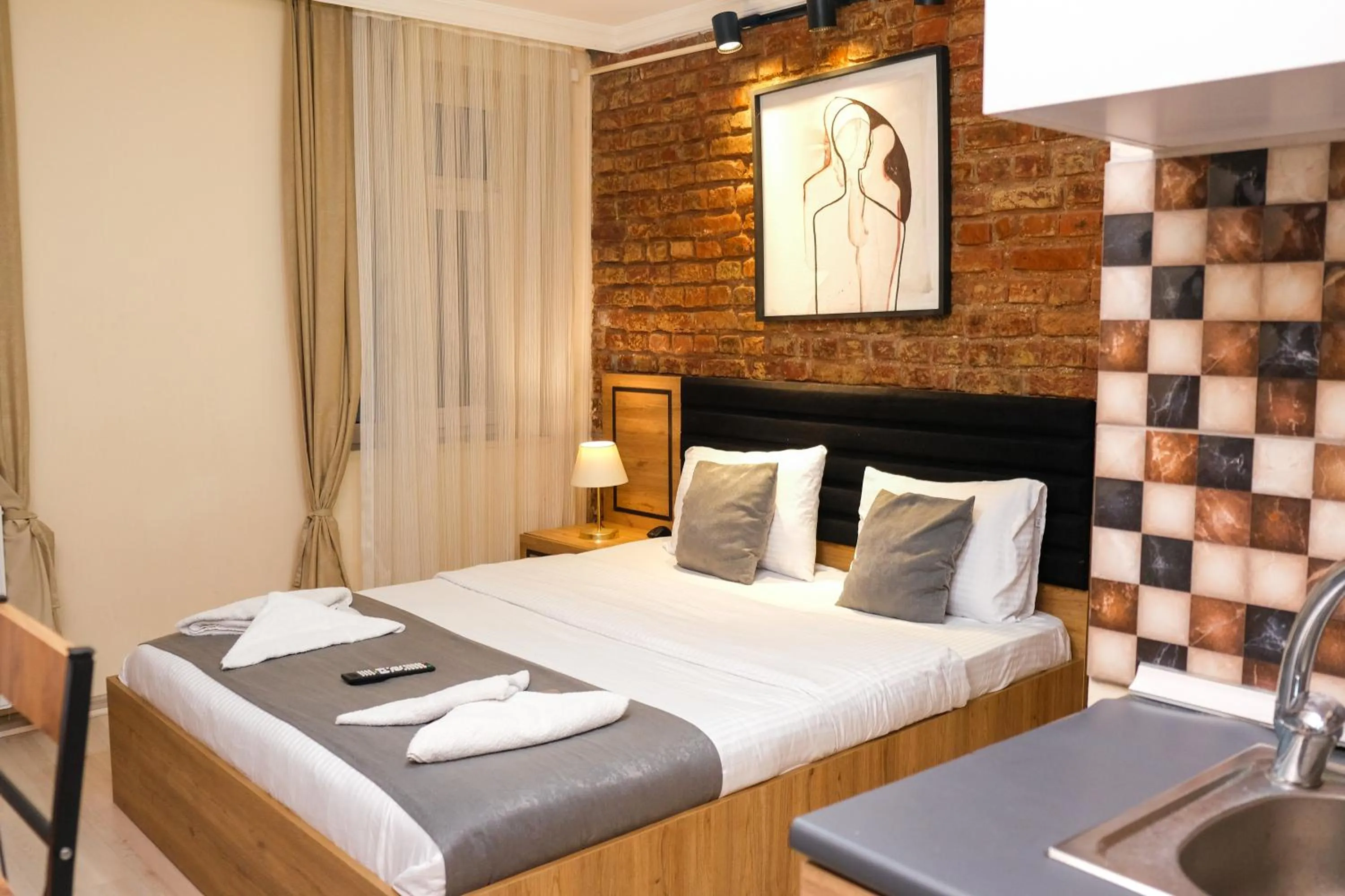 Bed in Taksim Nikea Suites 80