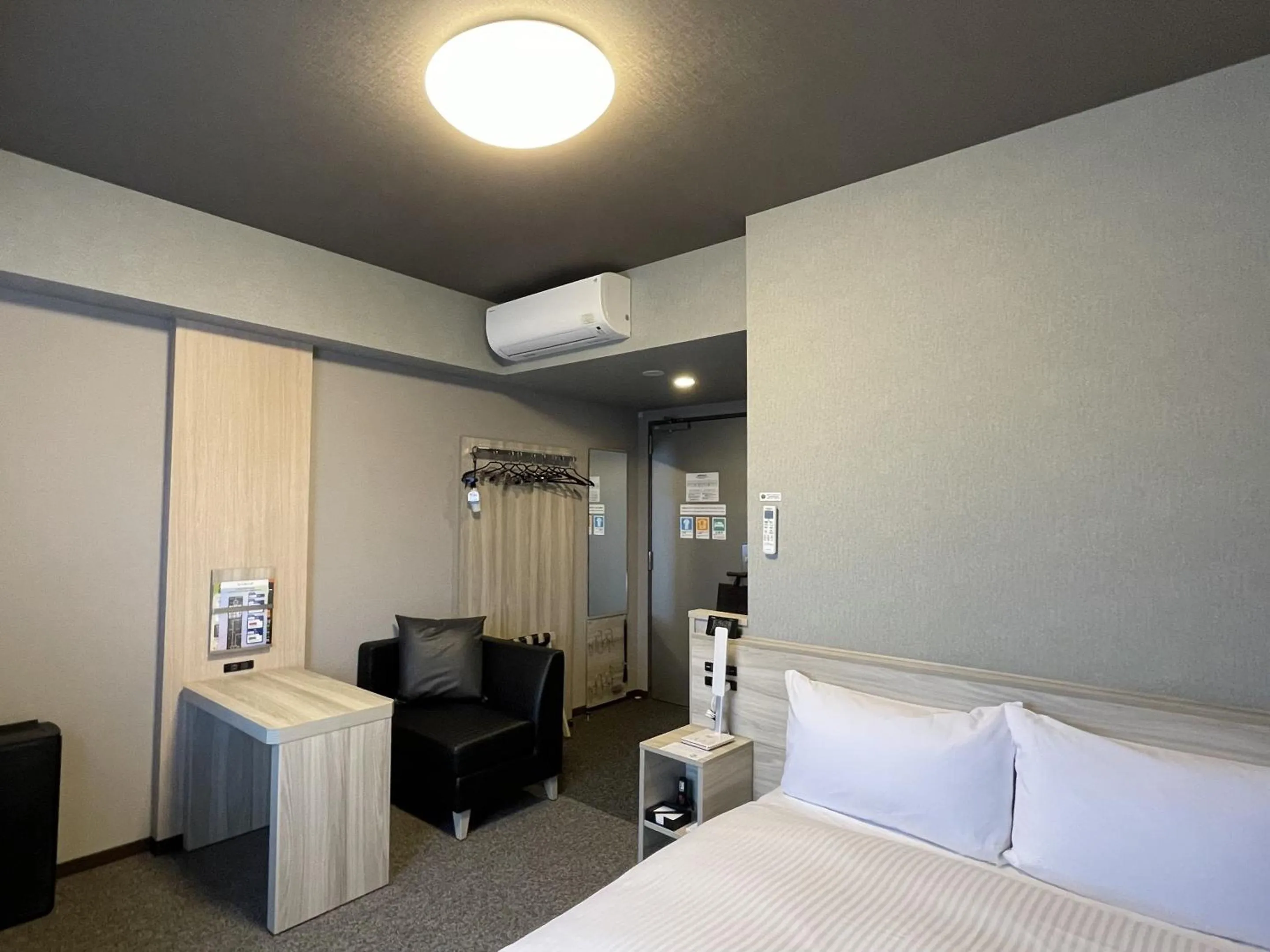 Photo of the whole room, Bed in Hotel Route Inn Ohi Takahama