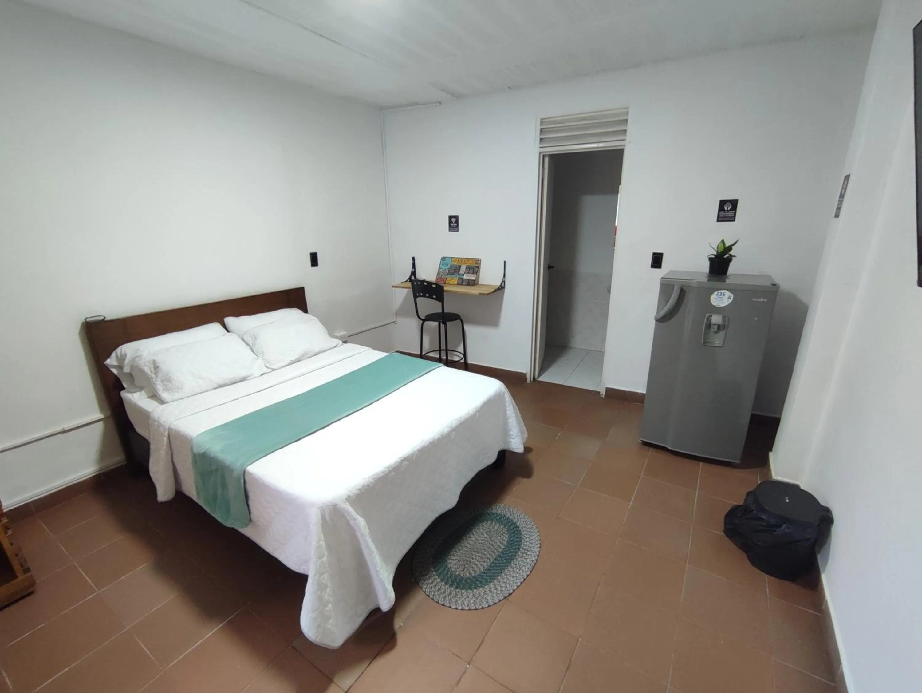 Bed in OUR HOME SAN ANTONIO