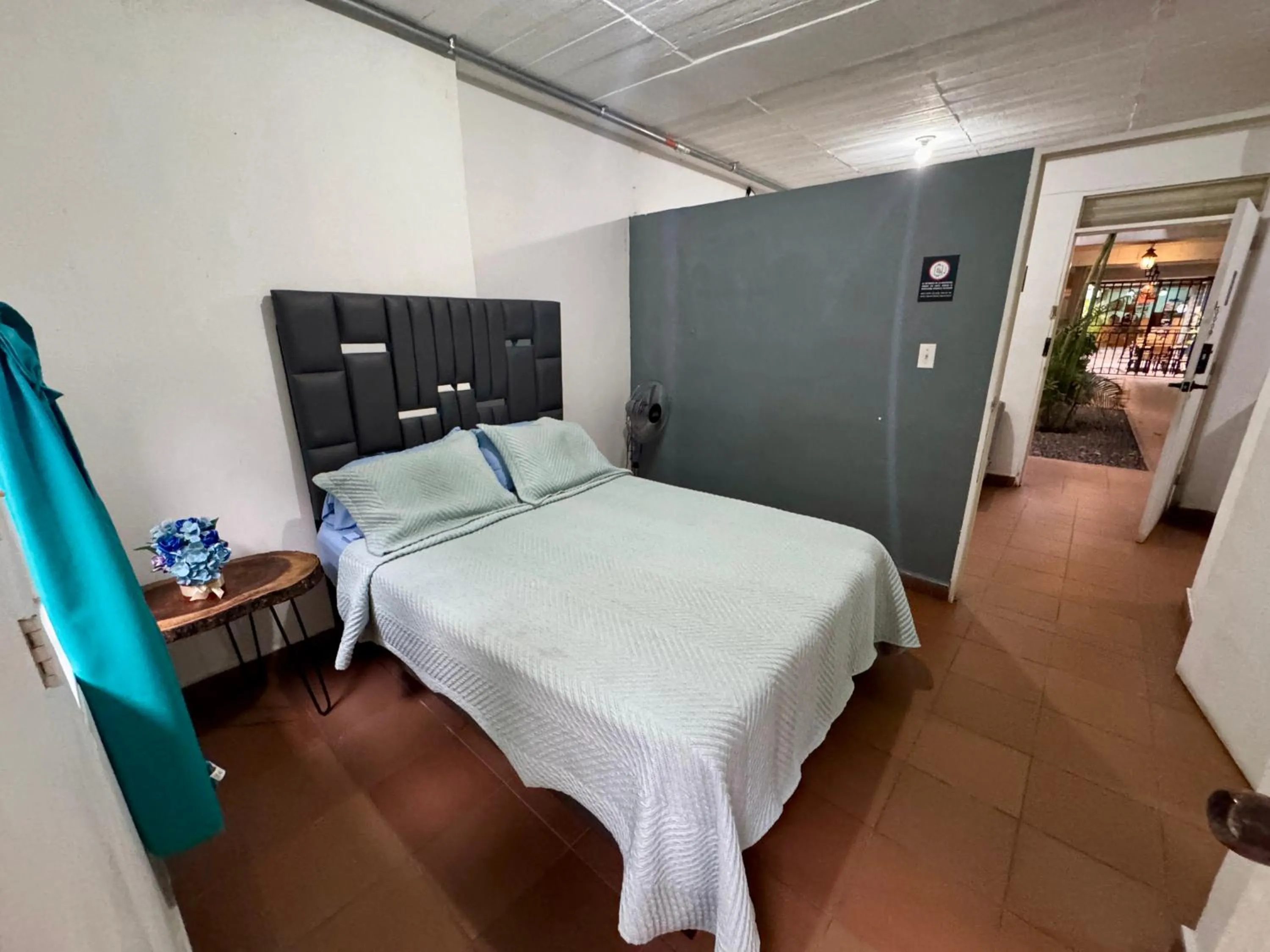 Bed in OUR HOME SAN ANTONIO