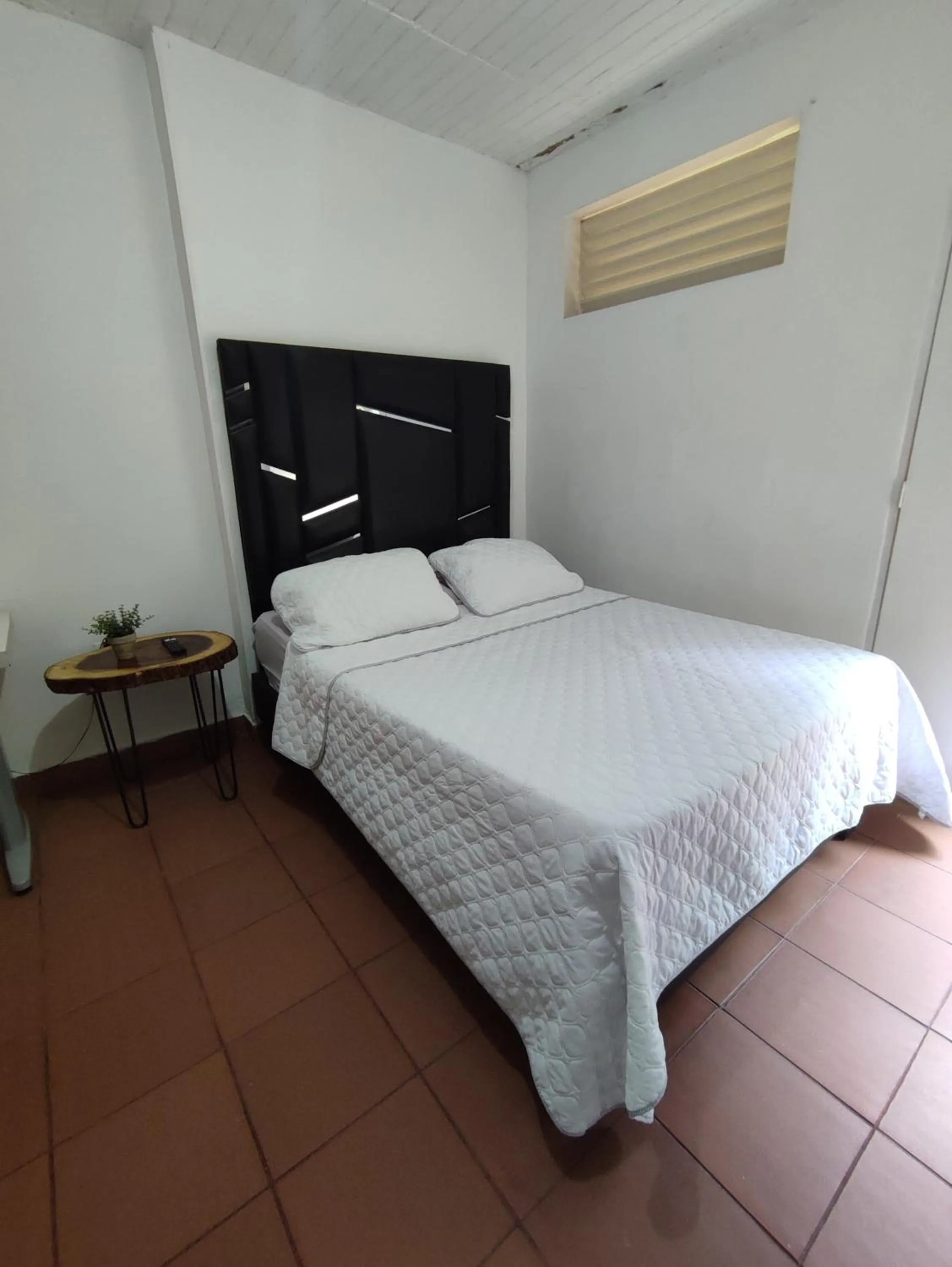 Bed in OUR HOME SAN ANTONIO