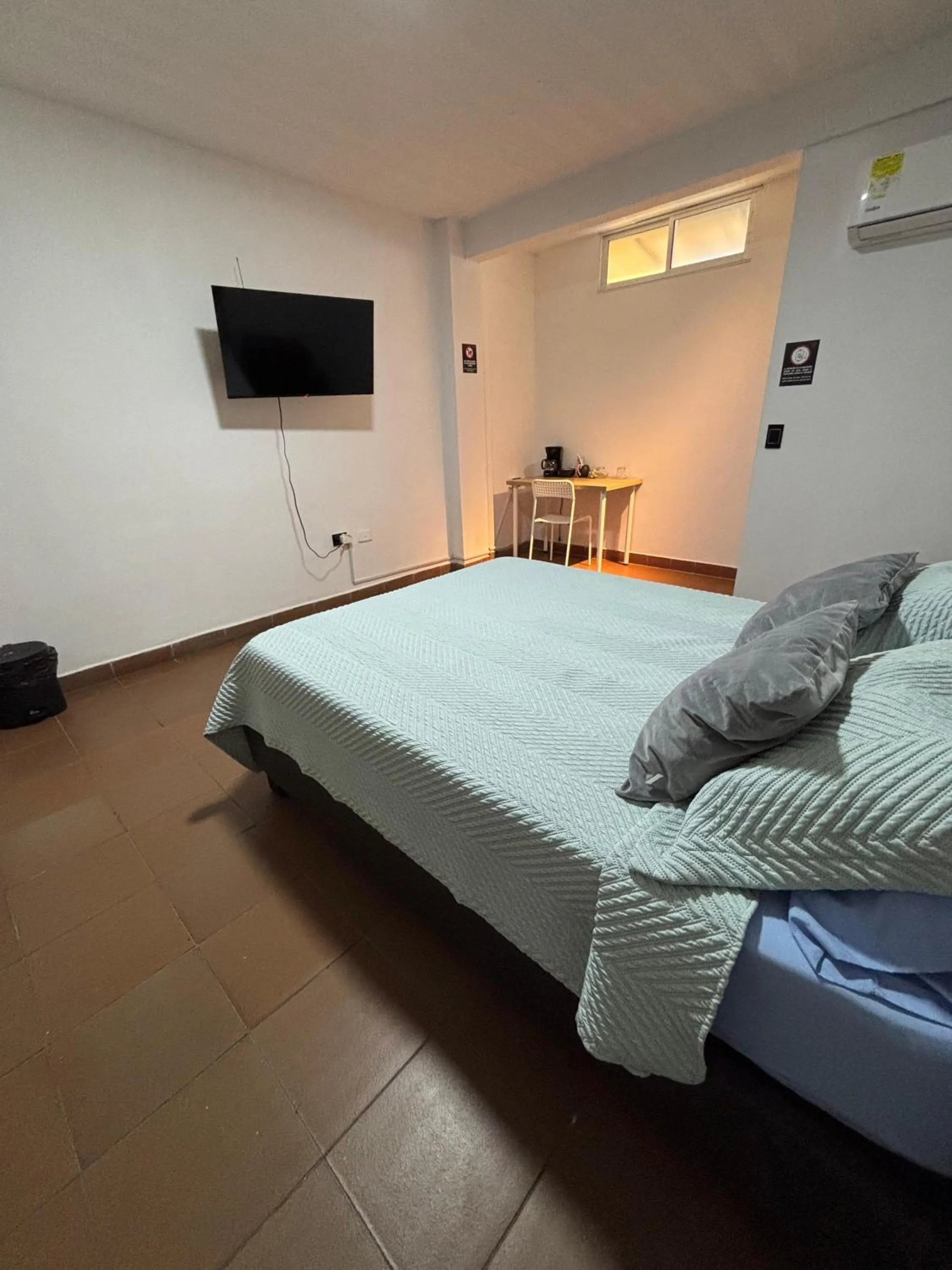 Bed in OUR HOME SAN ANTONIO