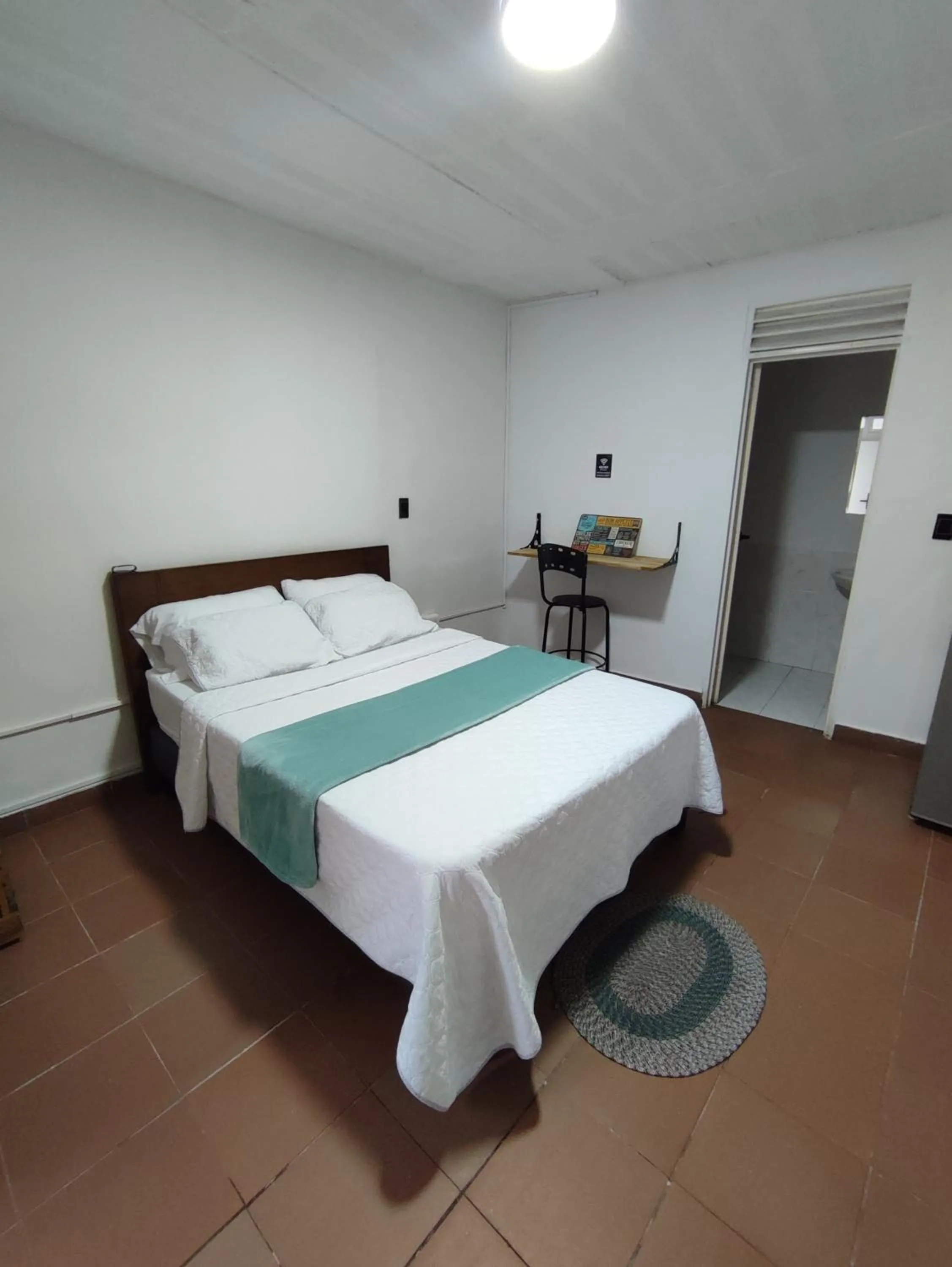 Bed in OUR HOME SAN ANTONIO