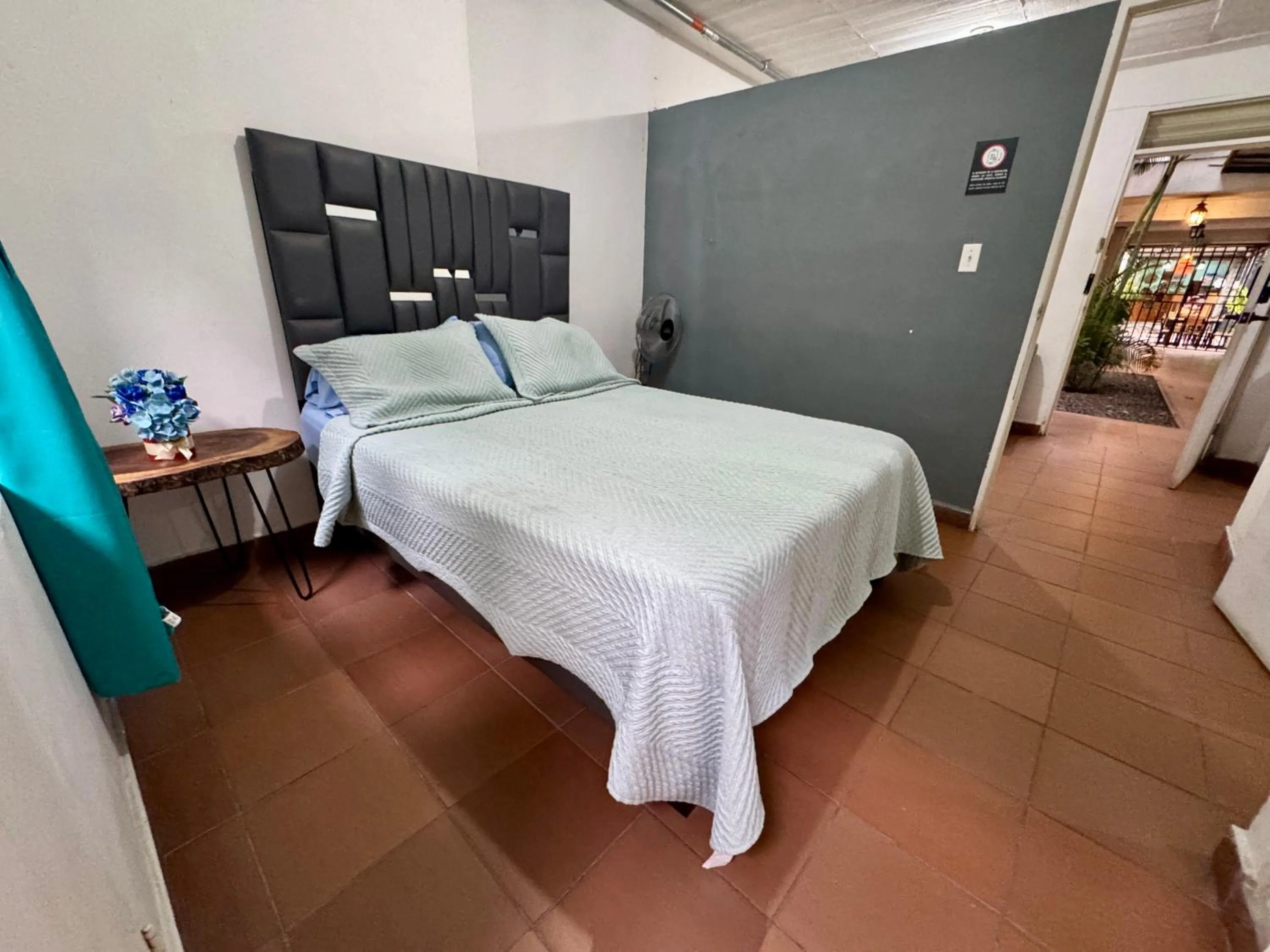 Bed in OUR HOME SAN ANTONIO