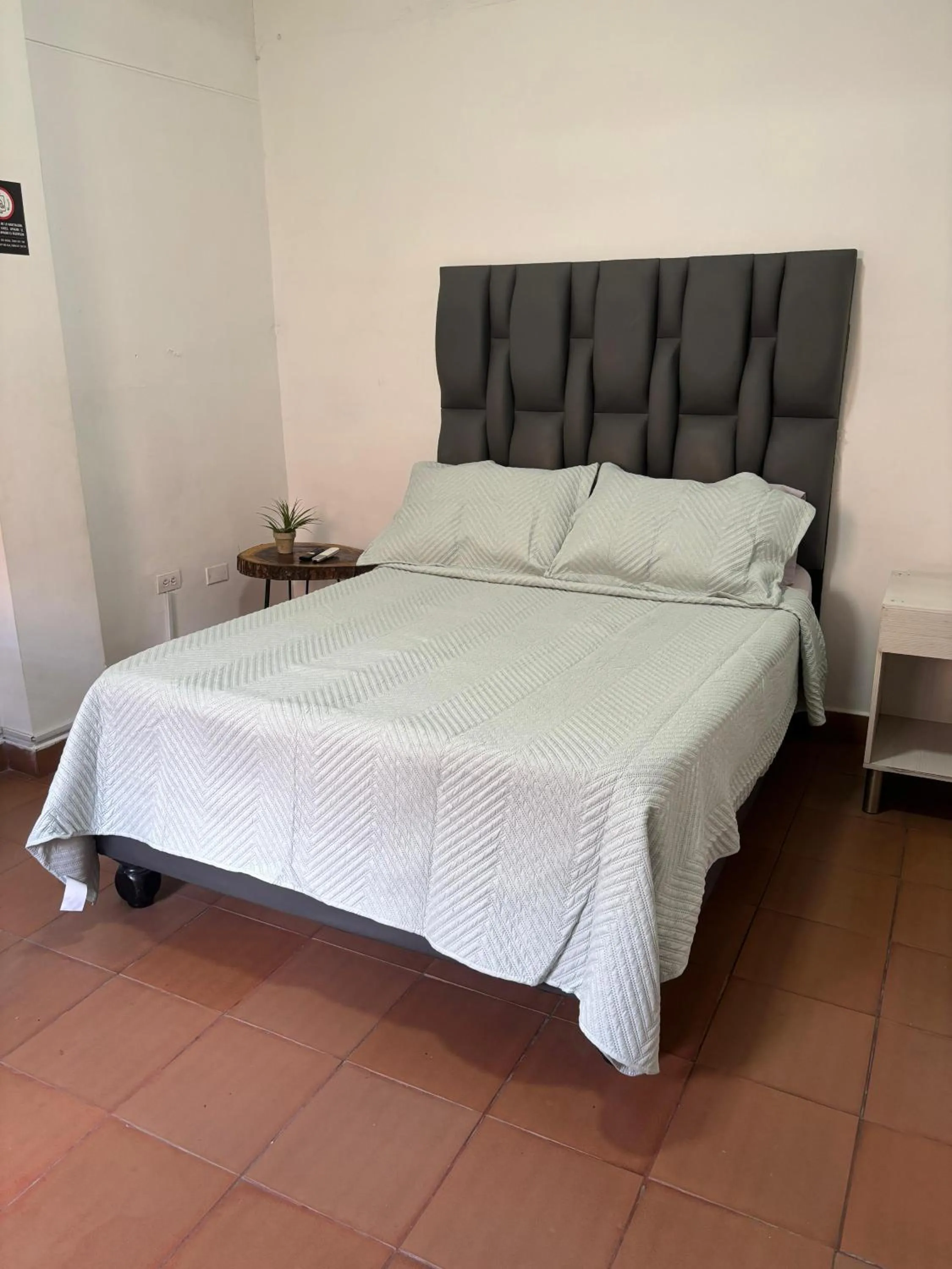 Bed in OUR HOME SAN ANTONIO