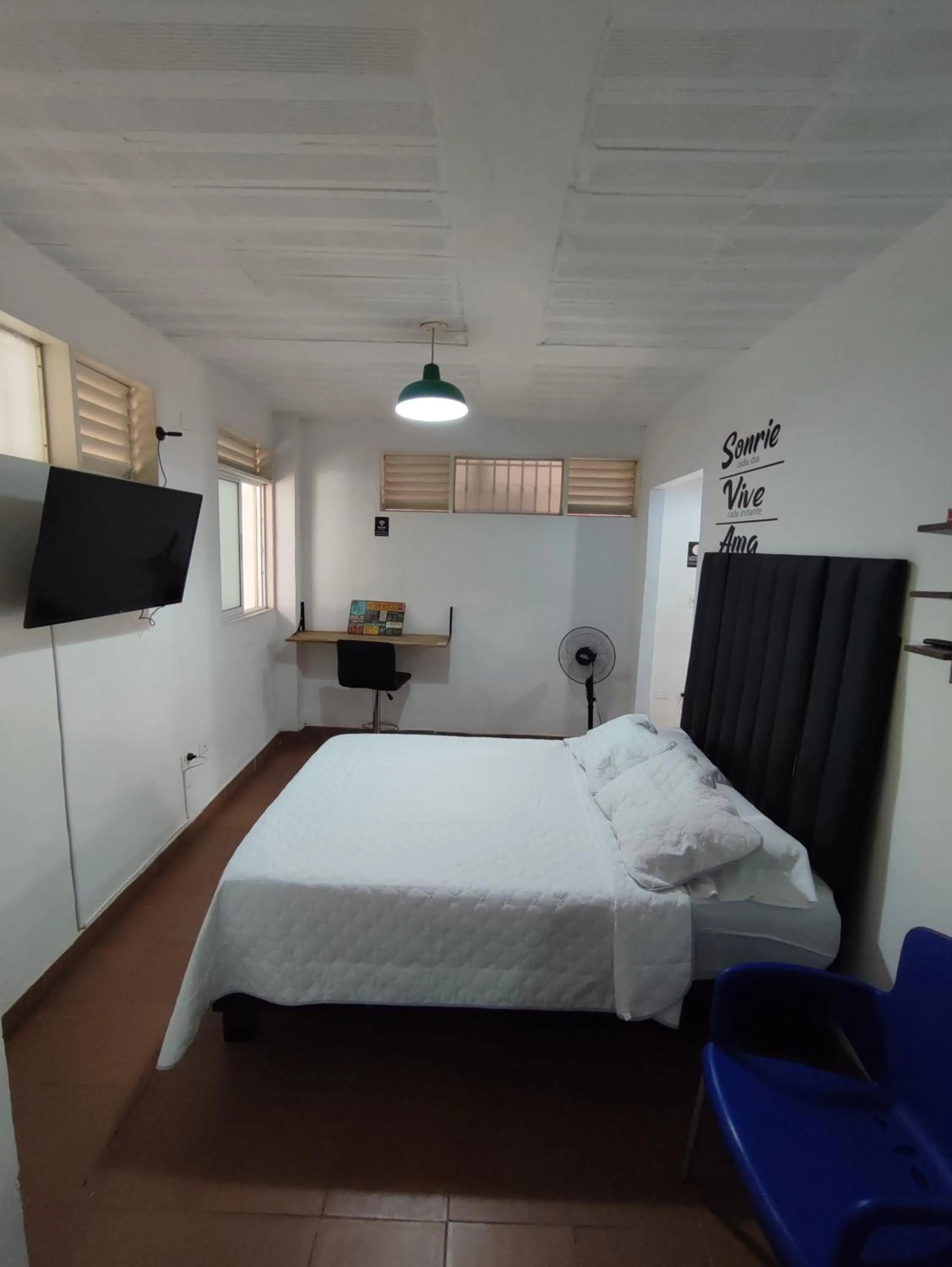 Bed in OUR HOME SAN ANTONIO