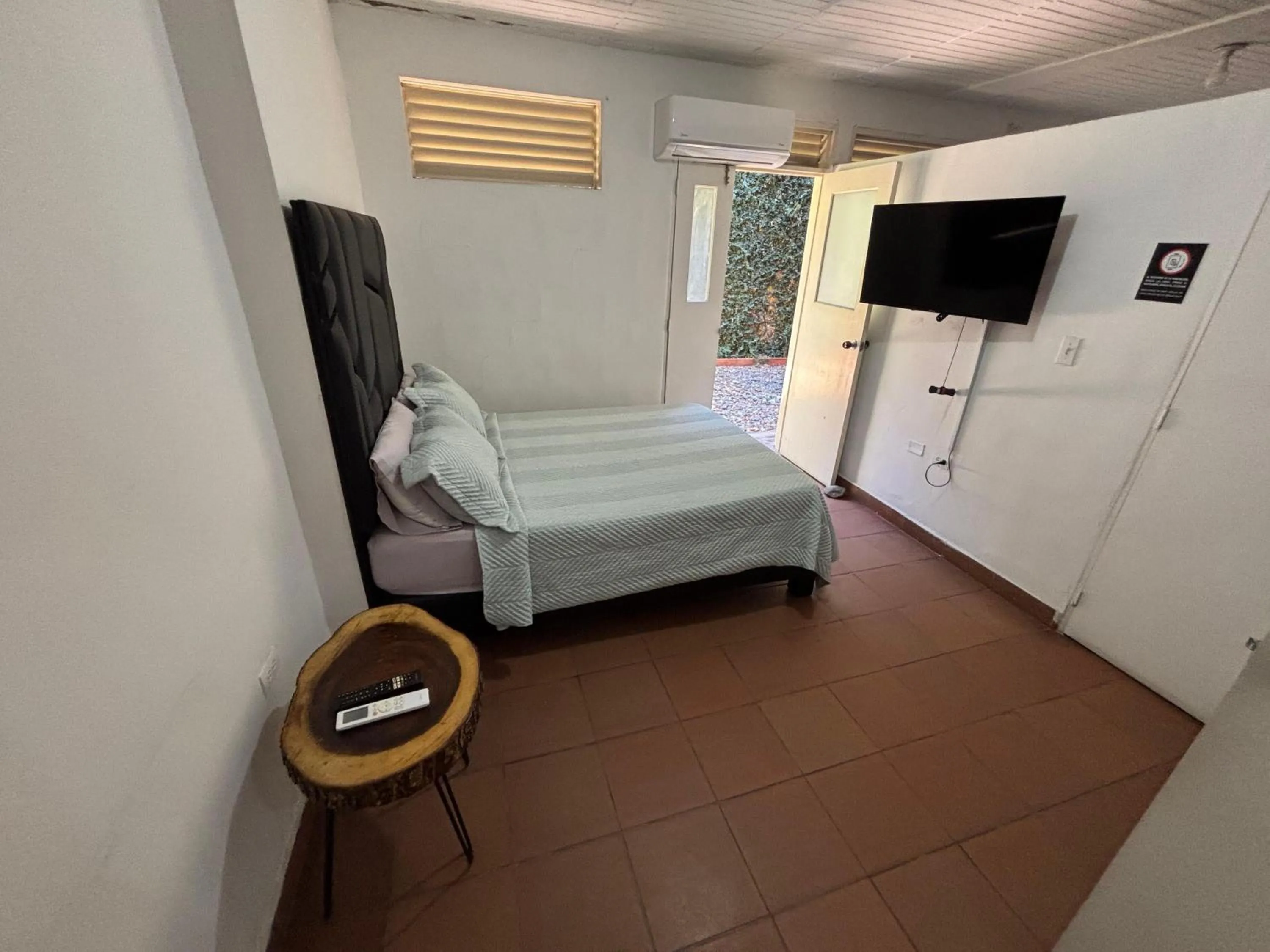 Bed in OUR HOME SAN ANTONIO