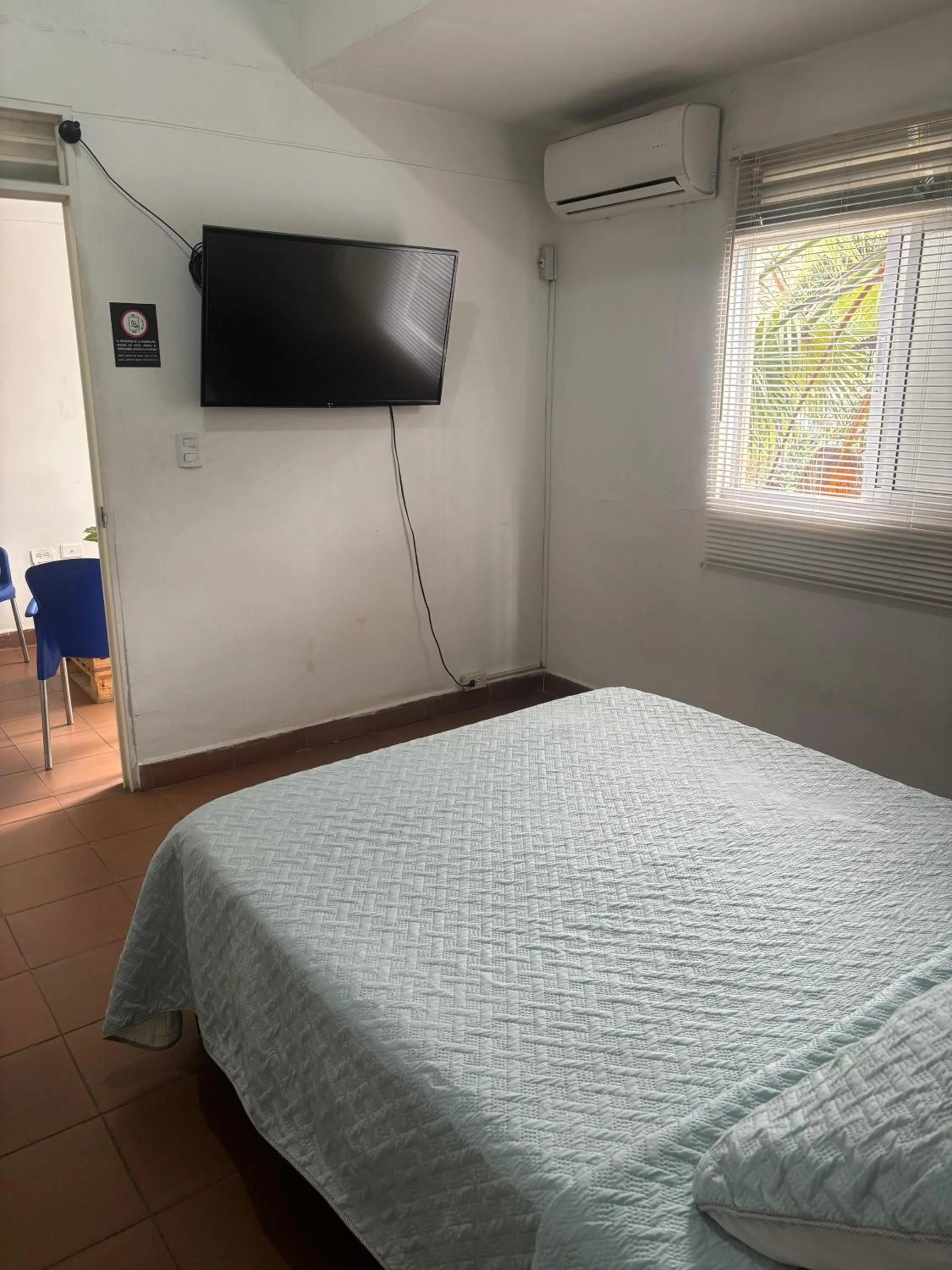 Bed in OUR HOME SAN ANTONIO