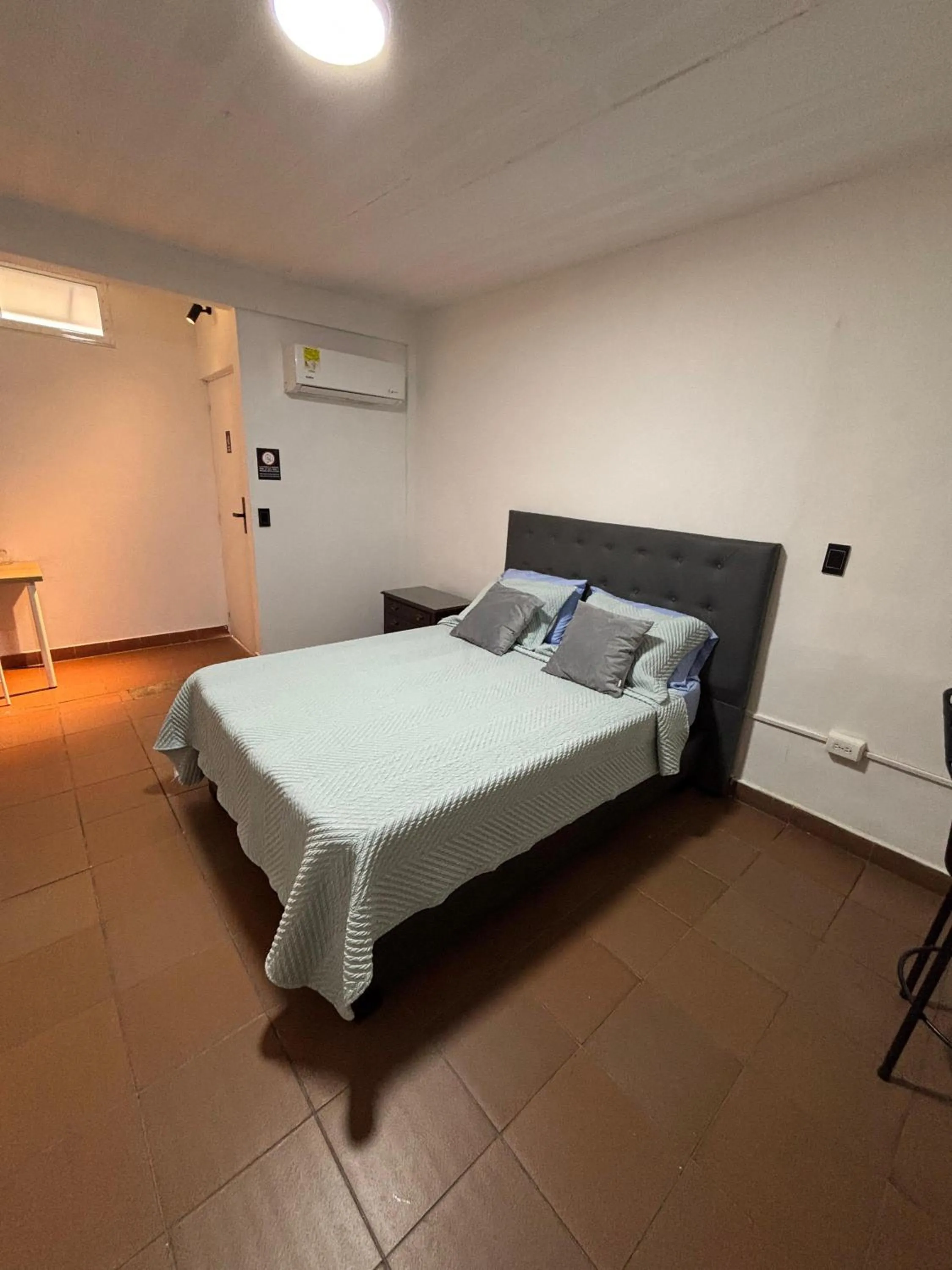 Bed in OUR HOME SAN ANTONIO