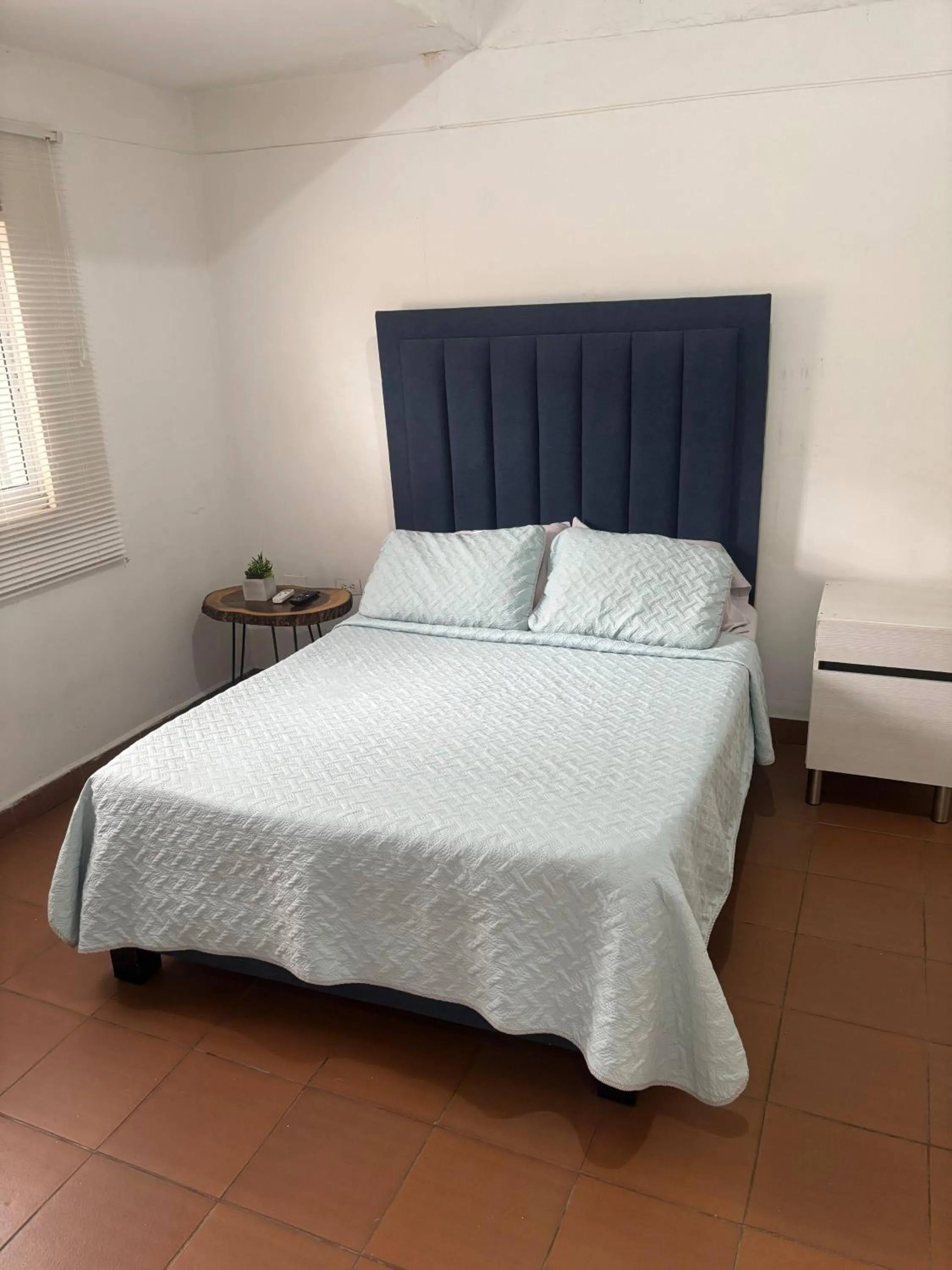 Bed in OUR HOME SAN ANTONIO