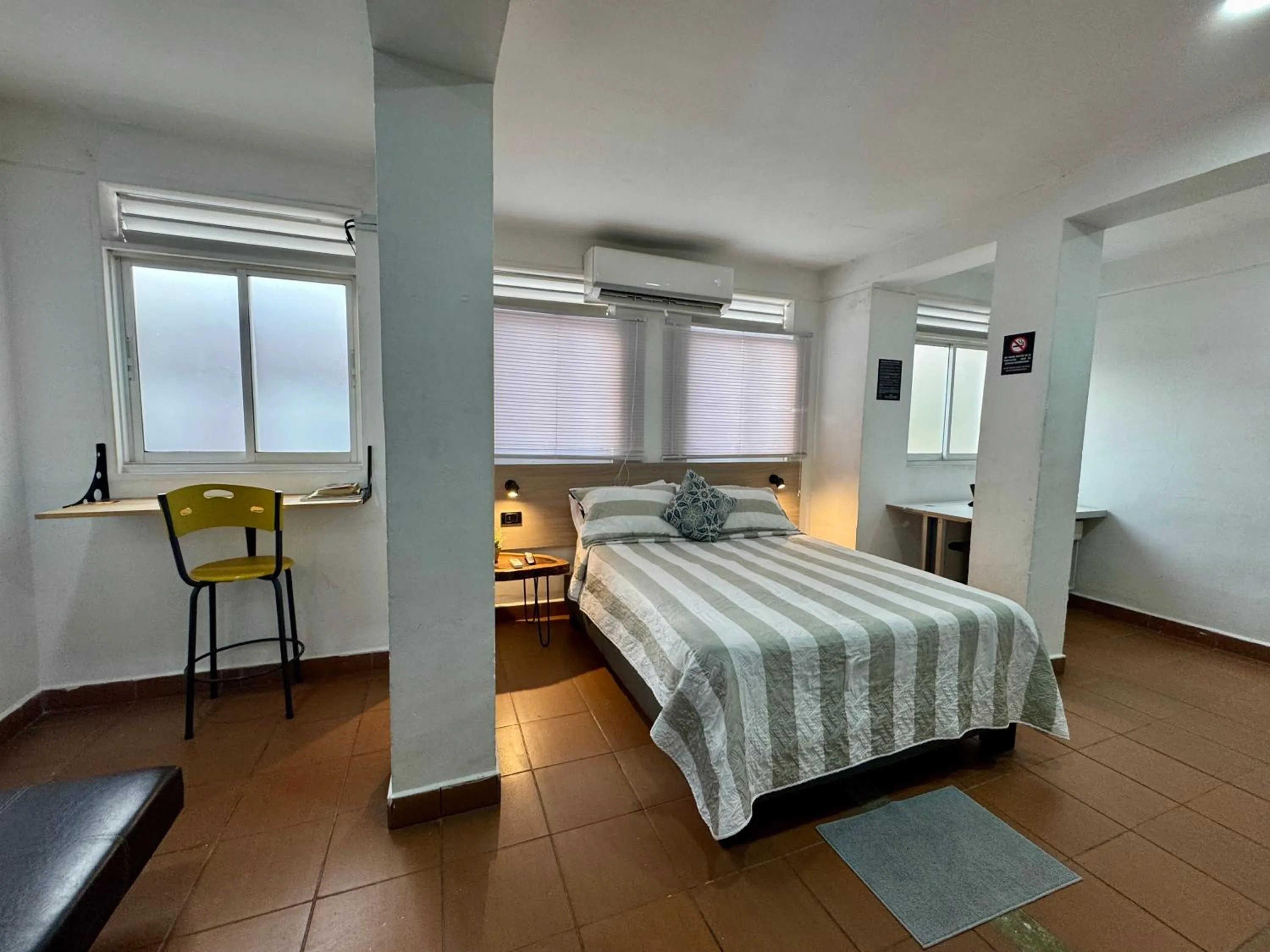 Bed in OUR HOME SAN ANTONIO