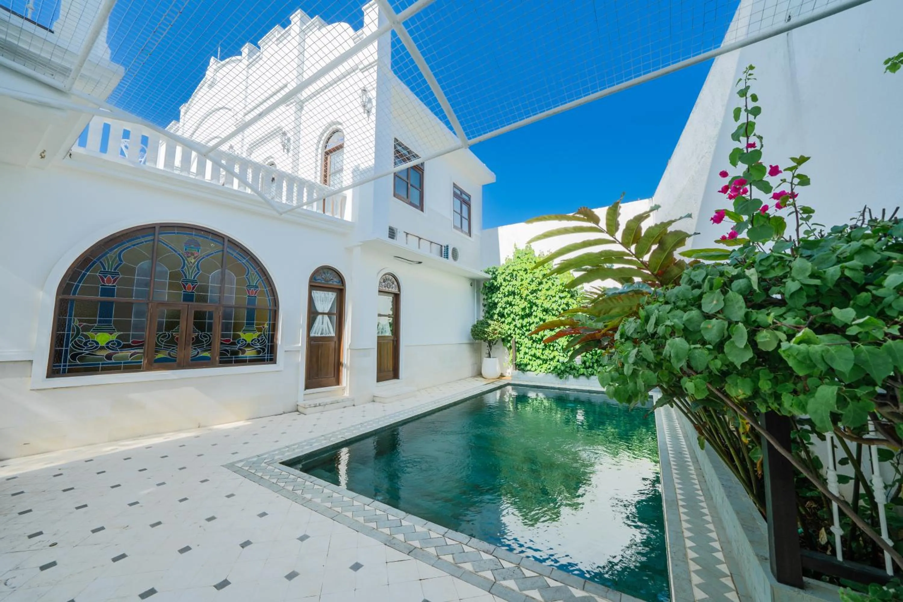 Pool view in Pitaloka Hotel Sanur By DeWizZ Management