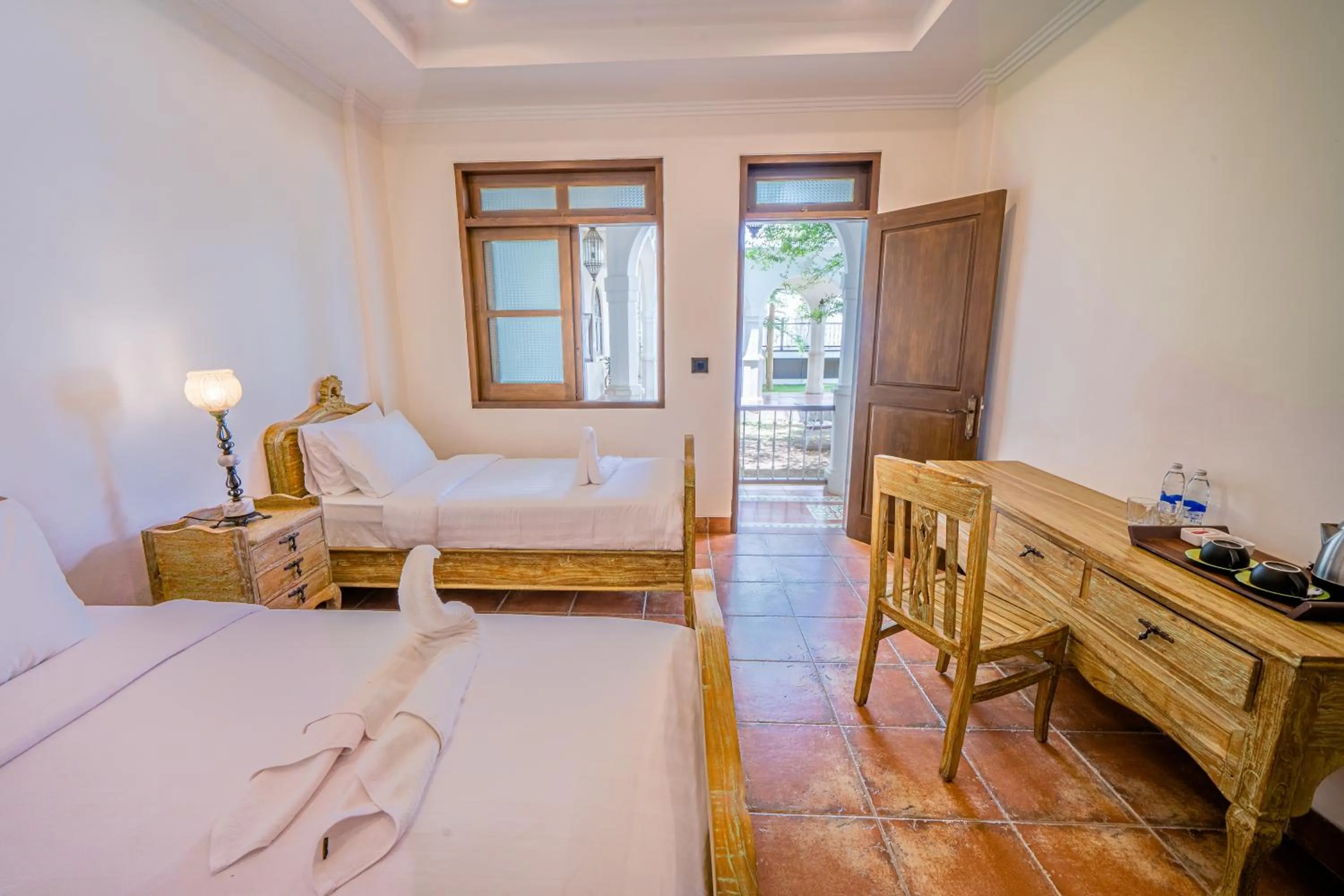 Photo of the whole room, Bed in Pitaloka Hotel Sanur By DeWizZ Management