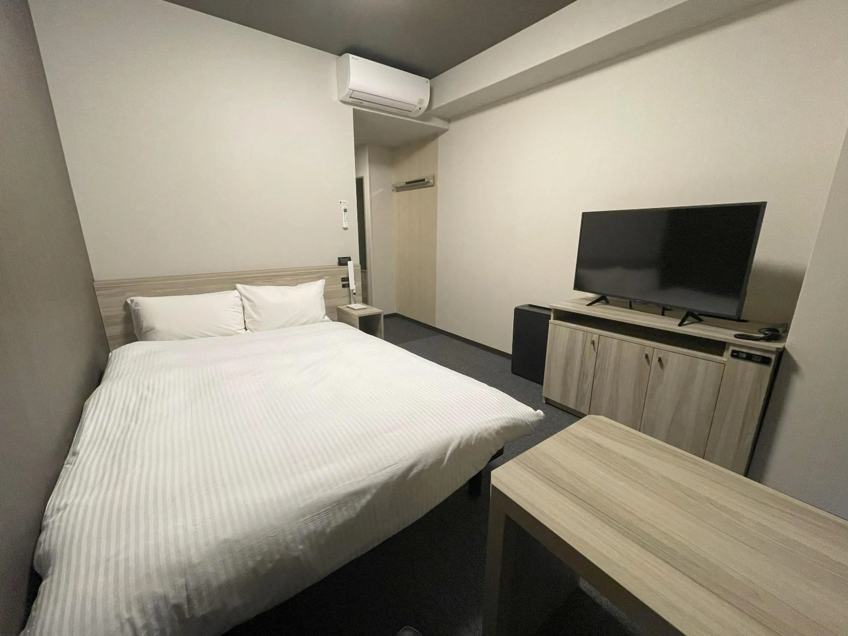 Photo of the whole room, Bed in Hotel Route Inn Numata