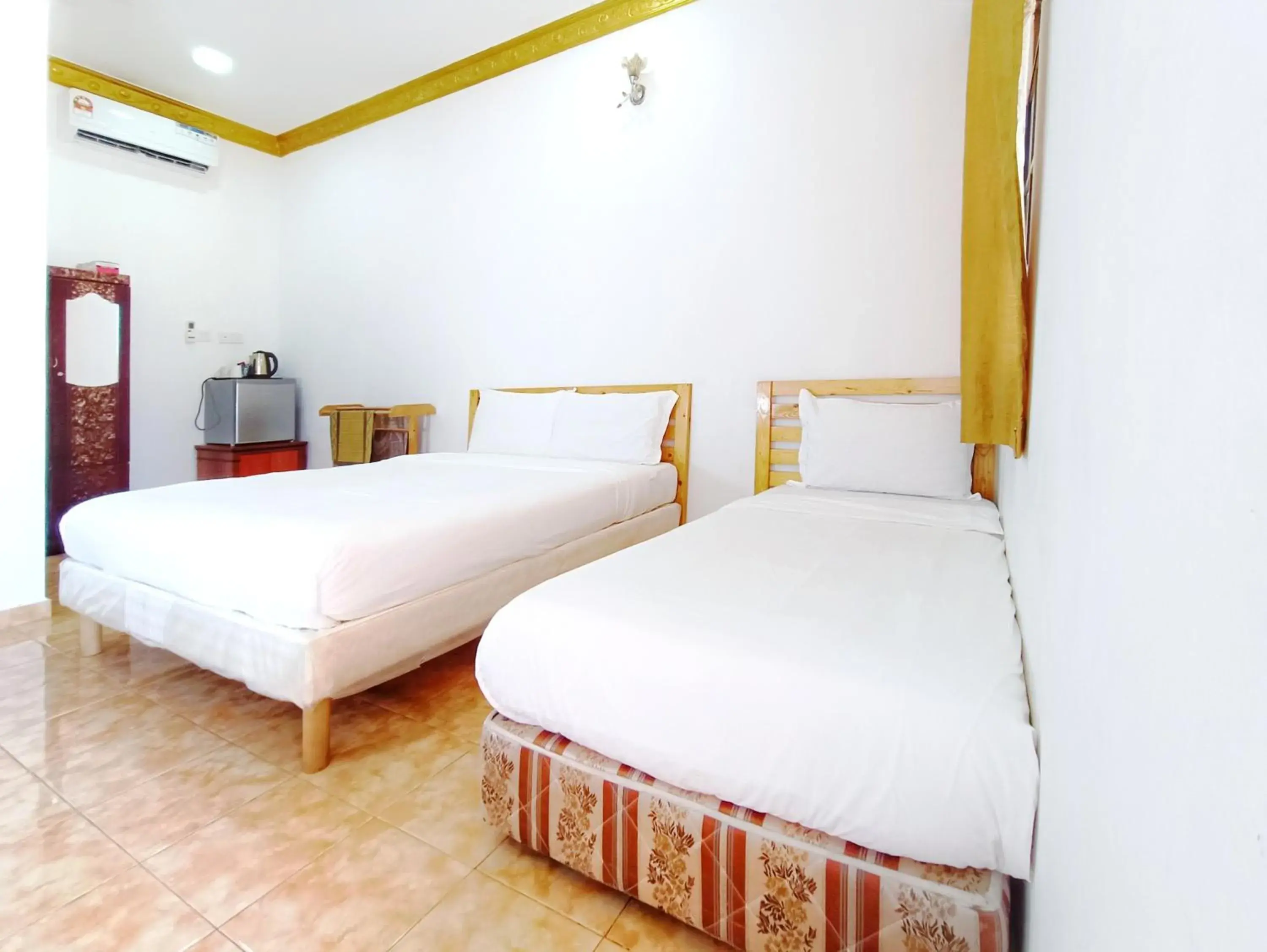 Deluxe Triple Room in Chalet Yunie Marang by RVH Deluxe Triple Room in Chalet Yunie Marang by RVH