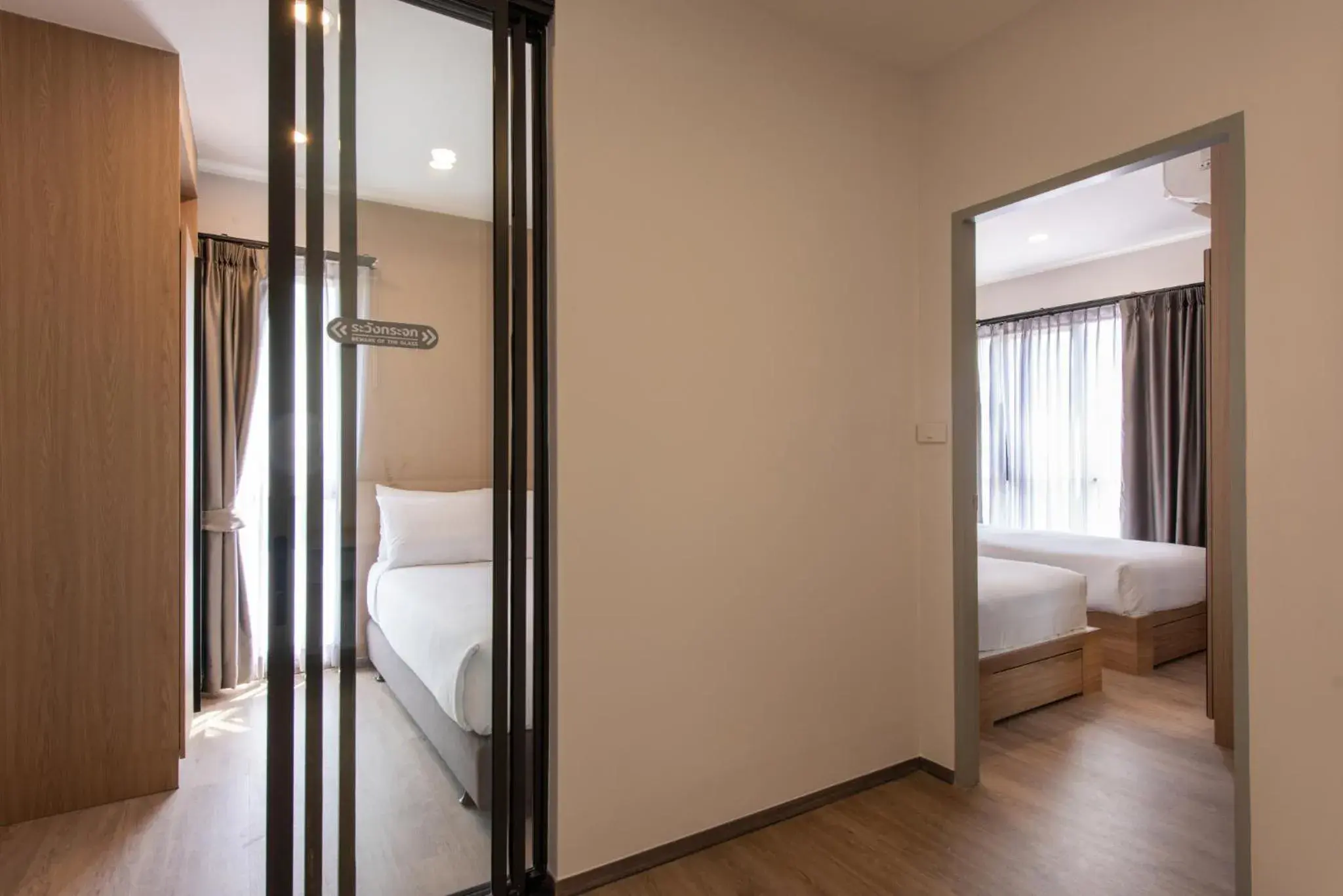 Deluxe Triple Room in Salaya One Hotel & Service Apartment Deluxe Triple Room in Salaya One Hotel & Service Apartment