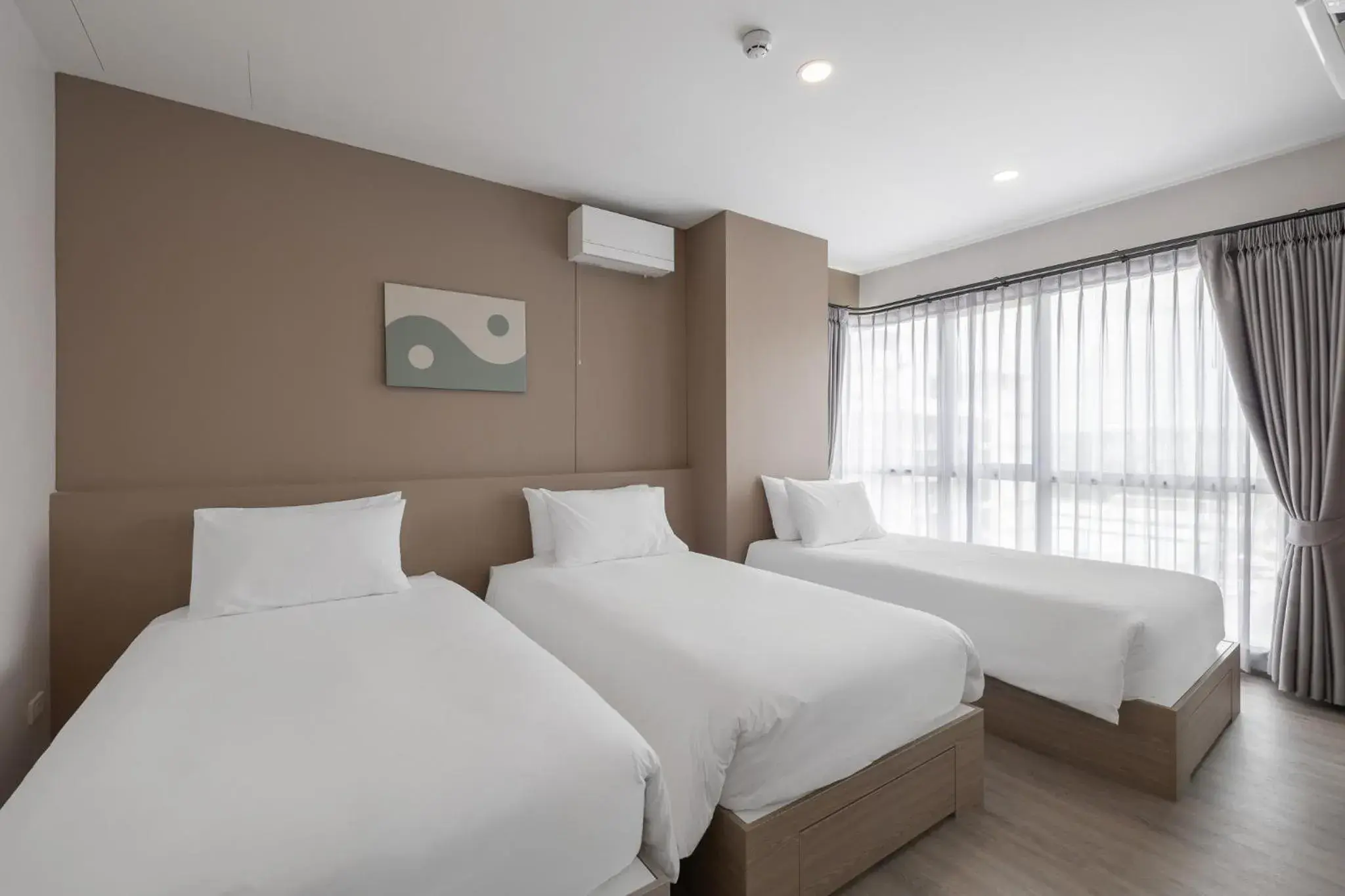 Deluxe Triple Room in Salaya One Hotel & Service Apartment Deluxe Triple Room in Salaya One Hotel & Service Apartment