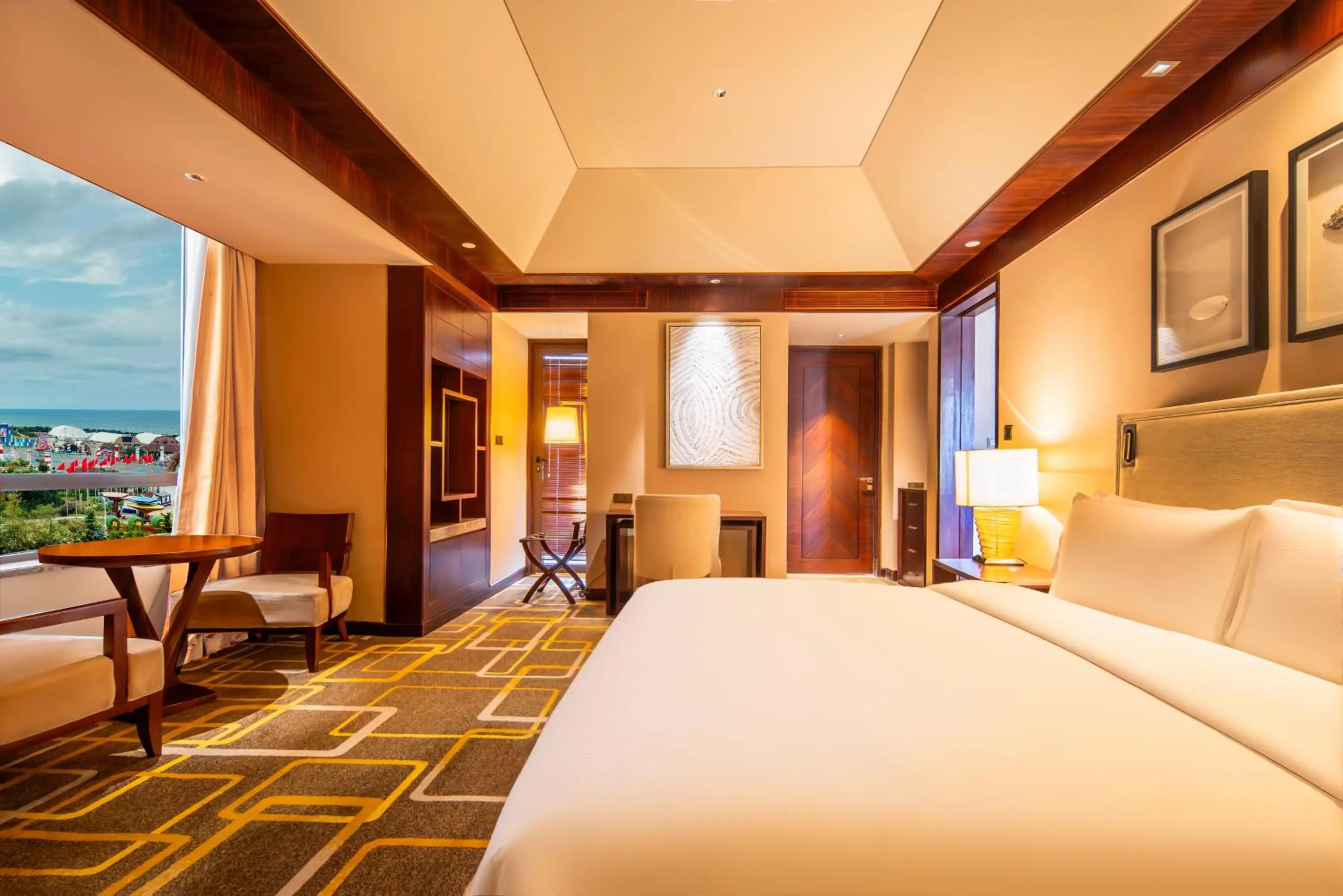 Property building, Bed in Hilton Qingdao Golden Beach