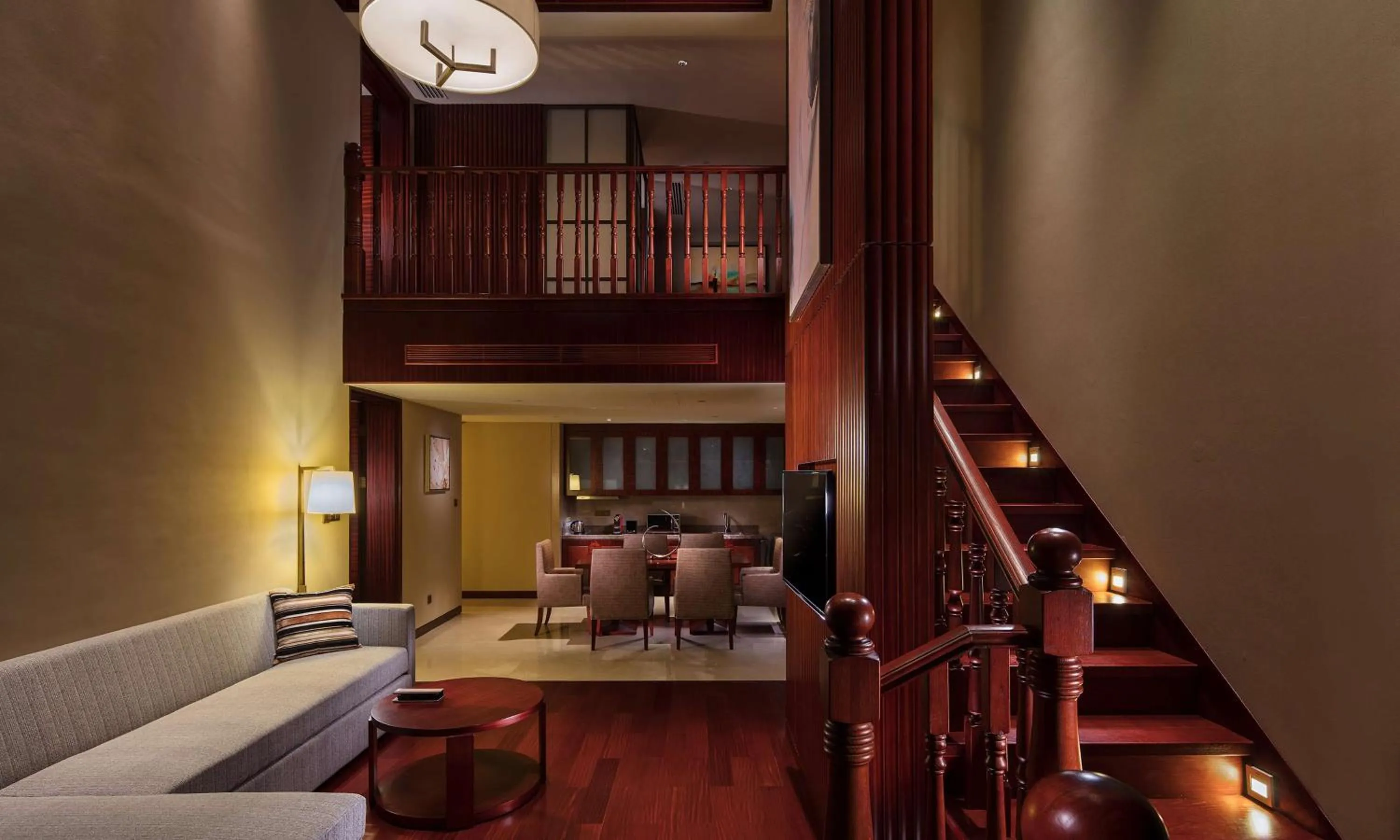 Living room, Bed in Hilton Qingdao Golden Beach