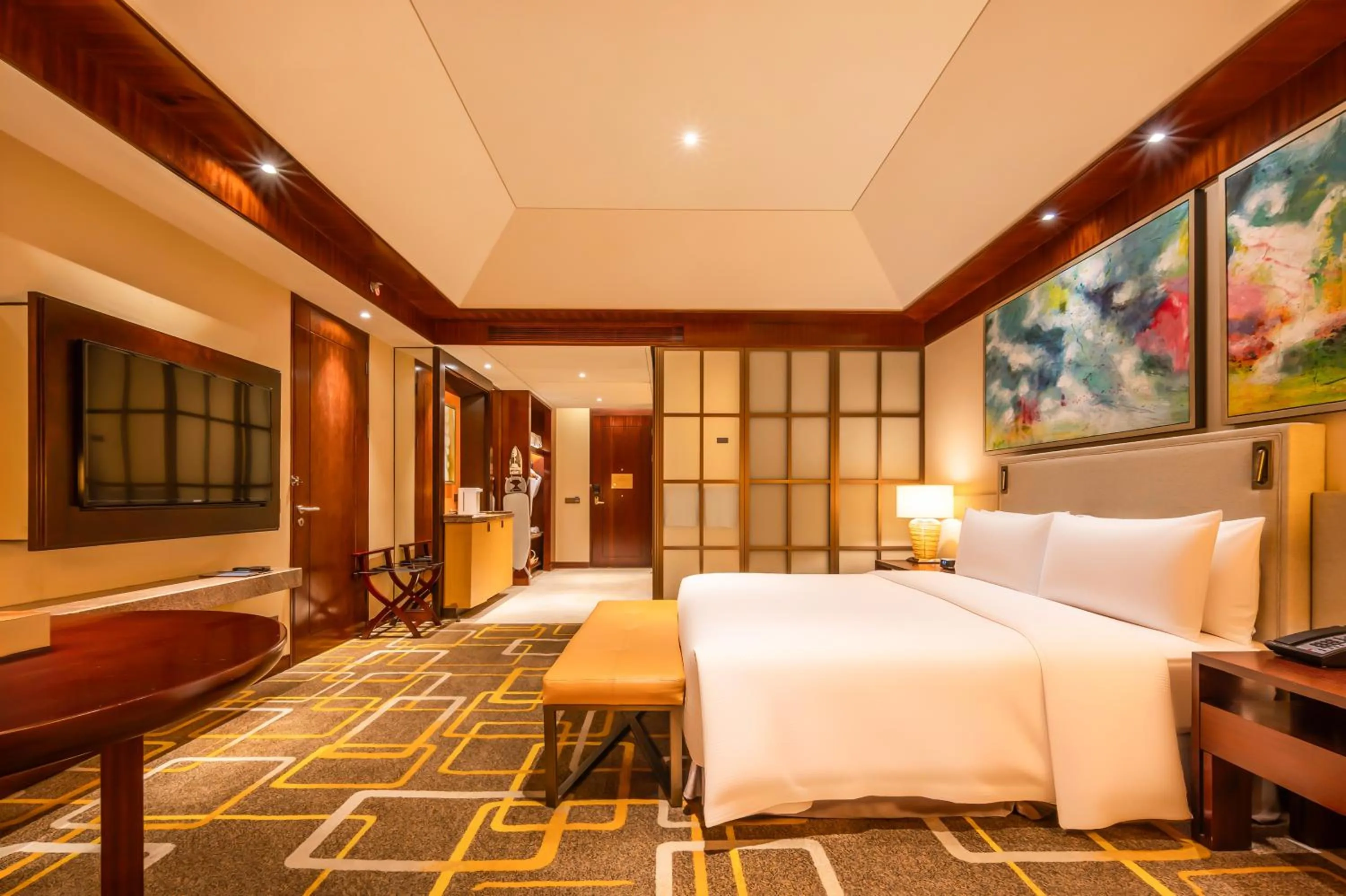 Property building, Bed in Hilton Qingdao Golden Beach