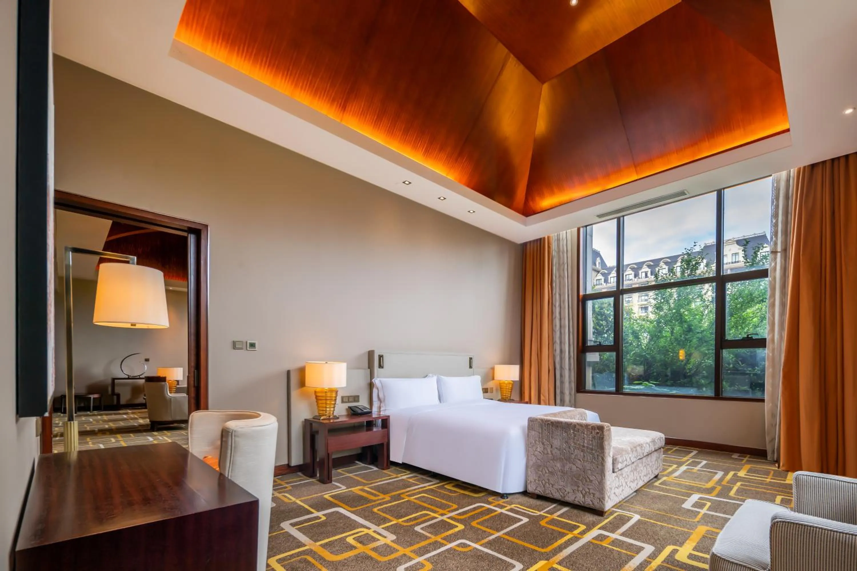 Property building, Bed in Hilton Qingdao Golden Beach