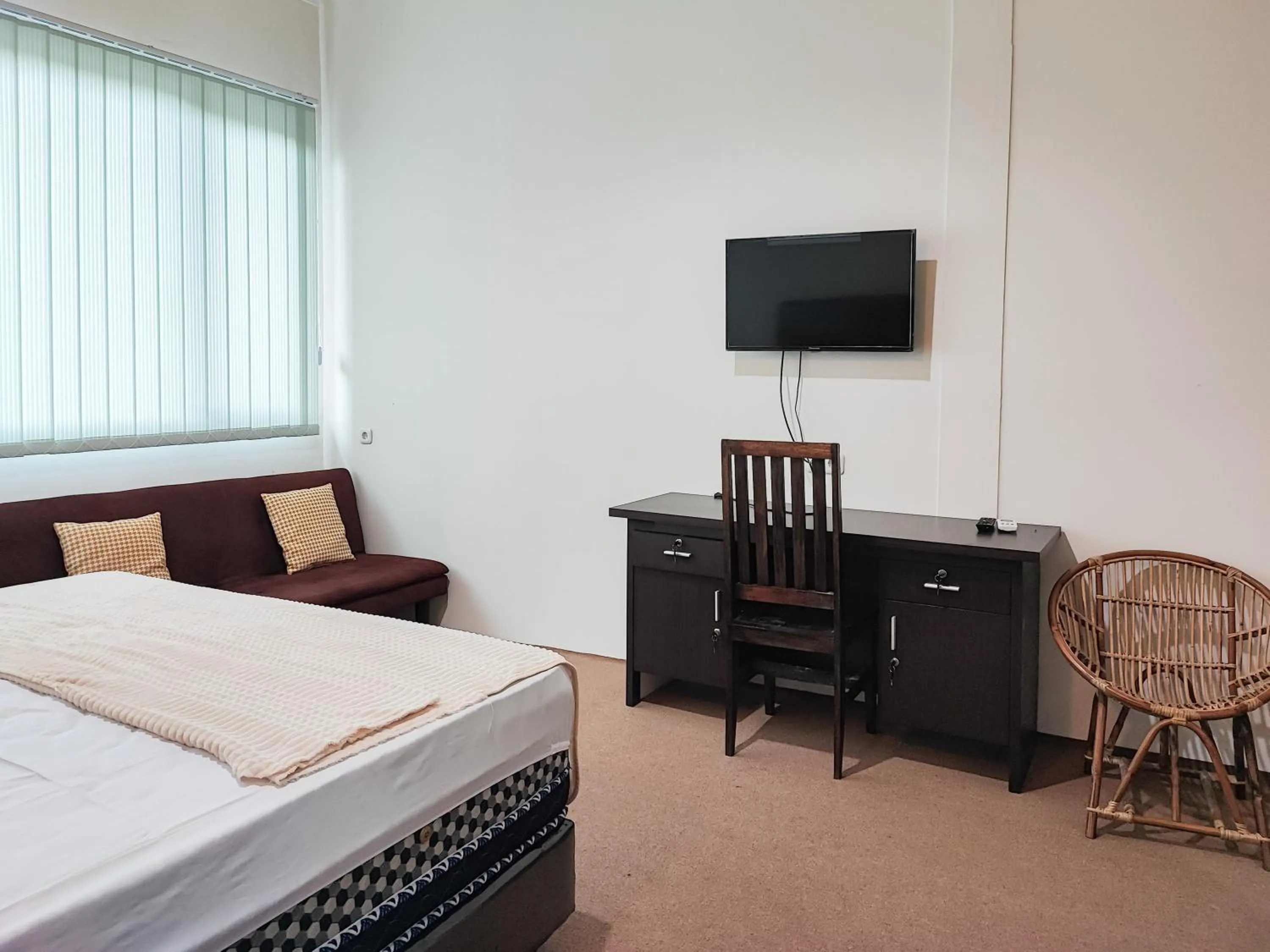 Bed in RedDoorz Plus Syariah near Simpang Rimbo Jambi 2