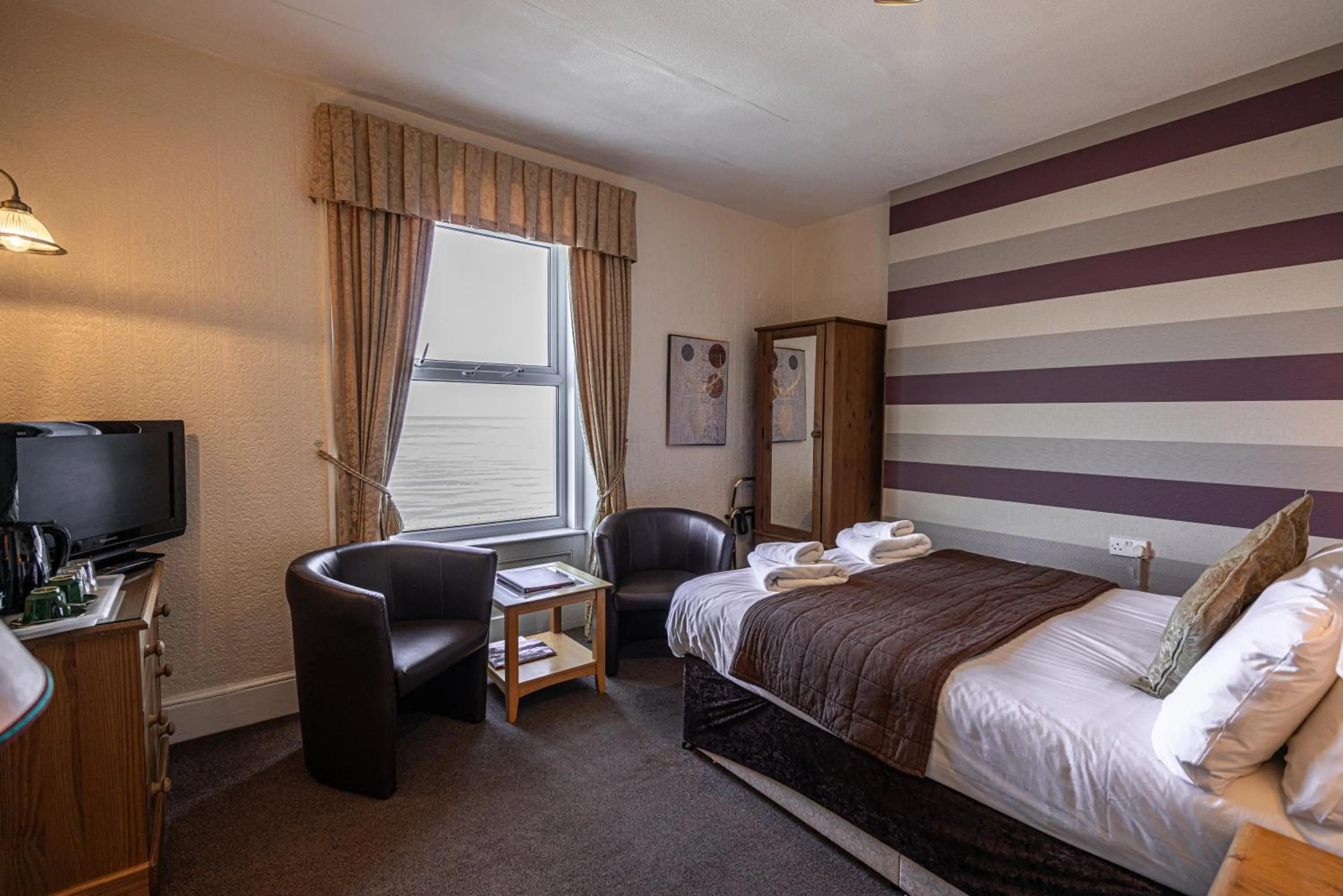 Bed in Can-Y-Bae Hotel