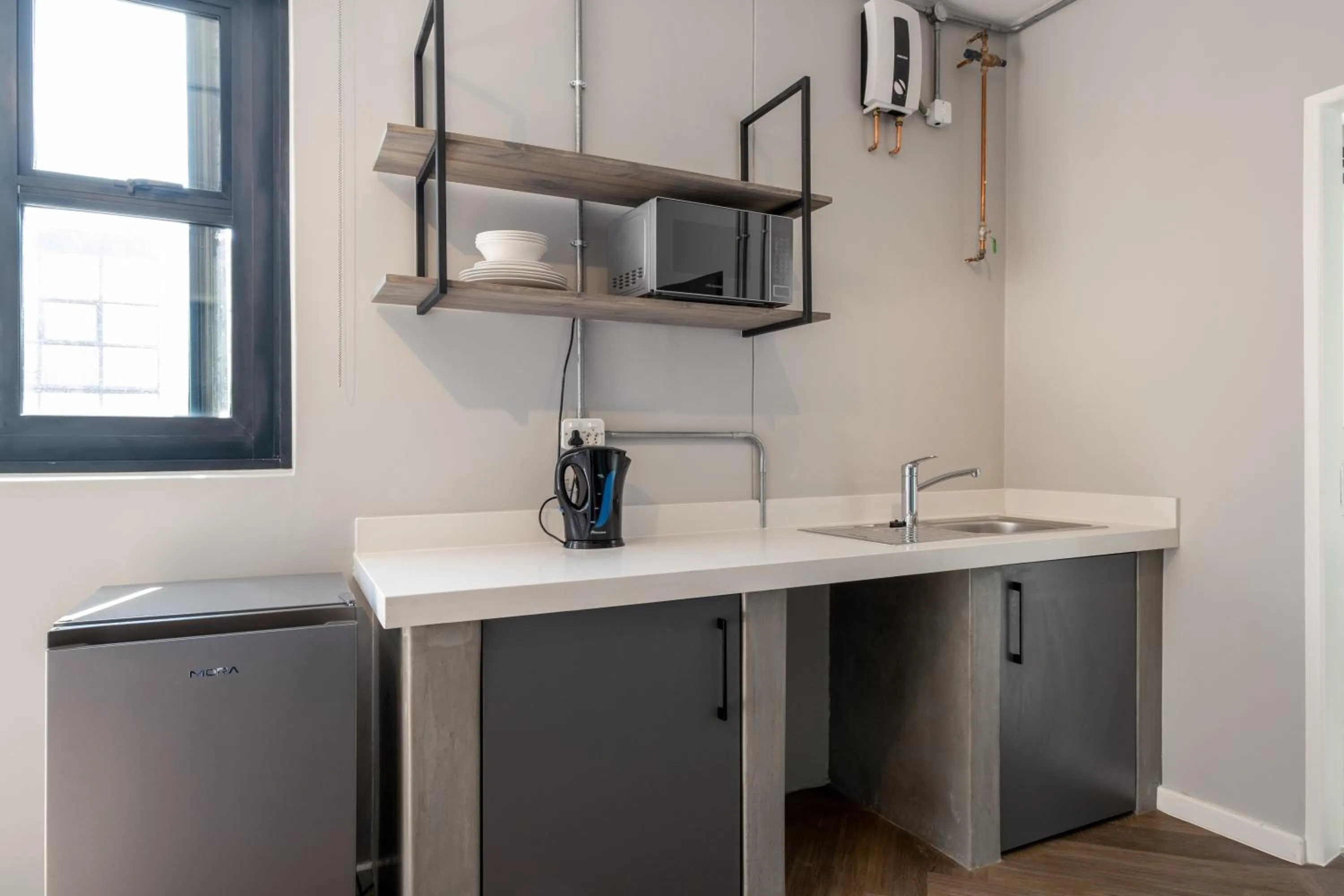 Kitchen or kitchenette in Inn & Out Plus Rosebank