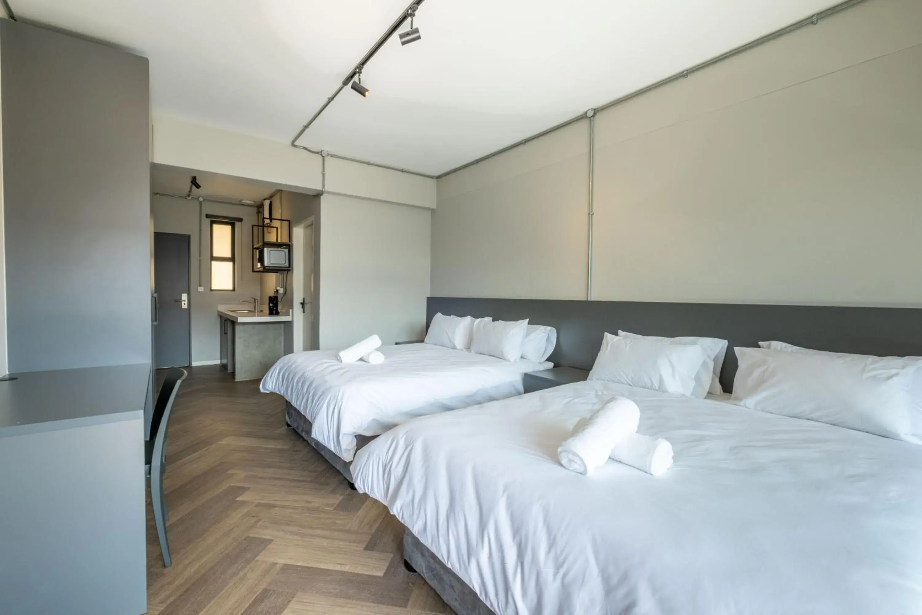 Deluxe Double or Twin Room with Balcony - single occupancy in Inn & Out Plus Rosebank Deluxe Double or Twin Room with Balcony - single occupancy in Inn & Out Plus Rosebank