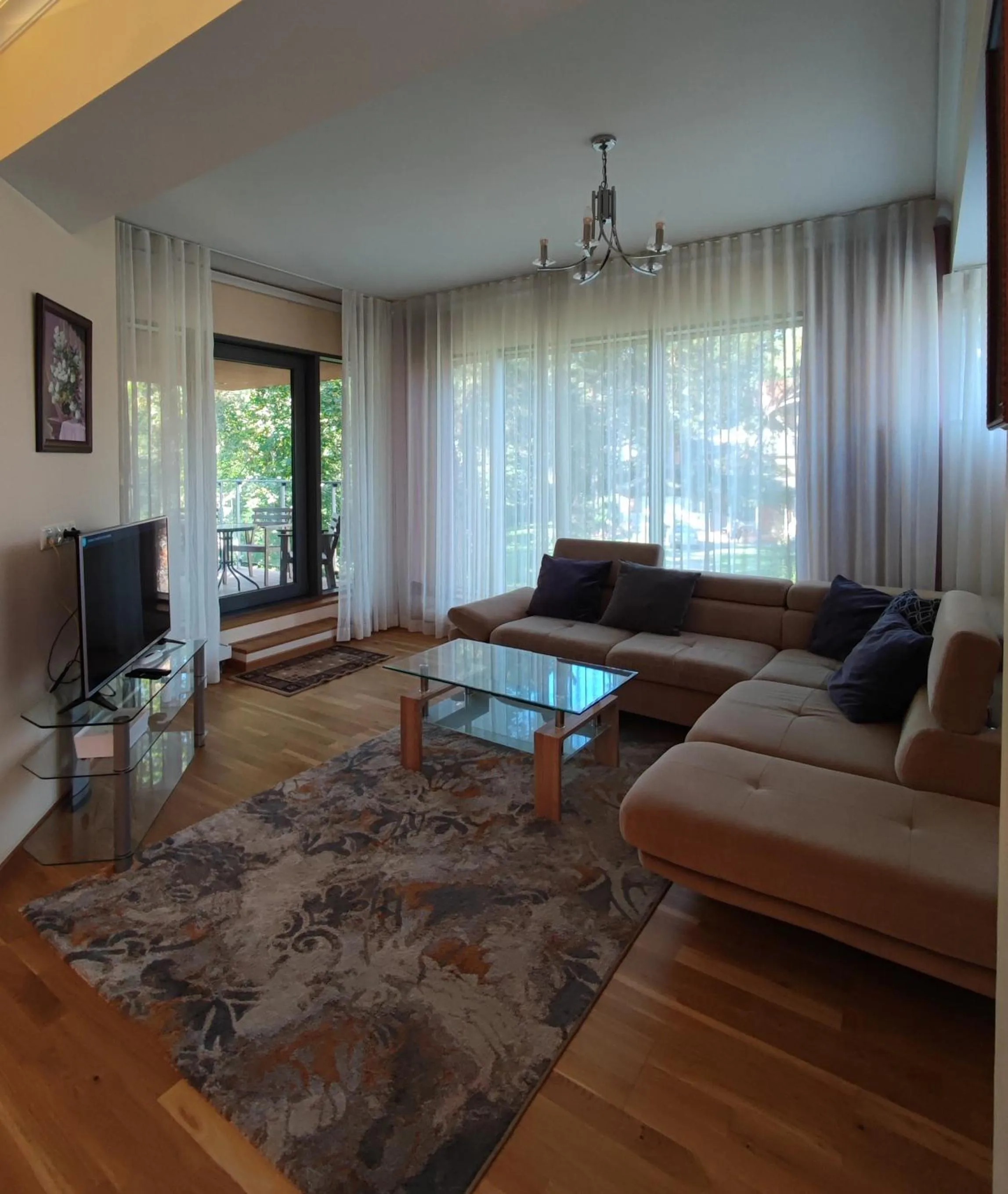 TV and multimedia in Saules Club Apart Hotel