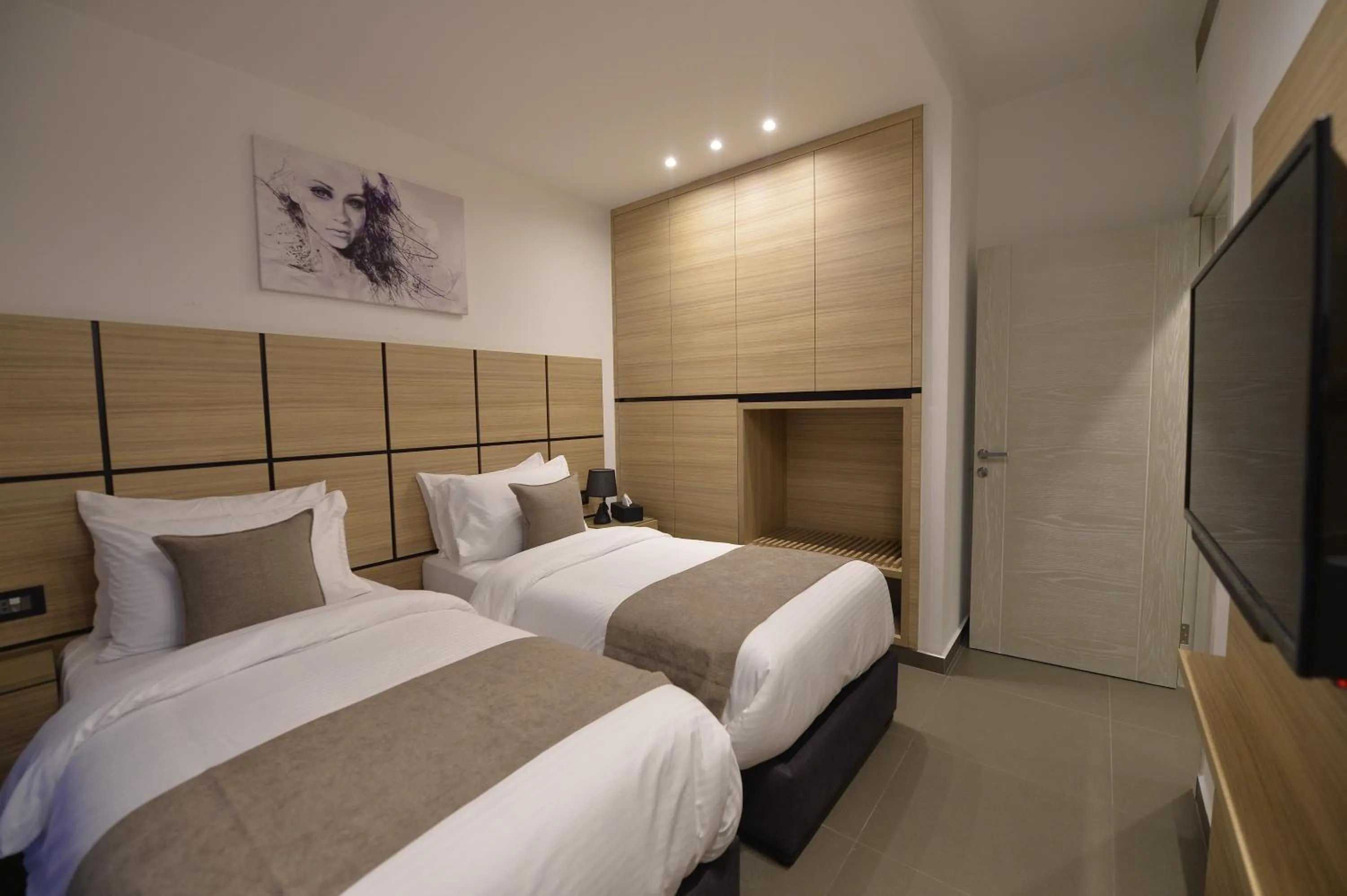 Communal lounge/ TV room, Bed in Zett hotel