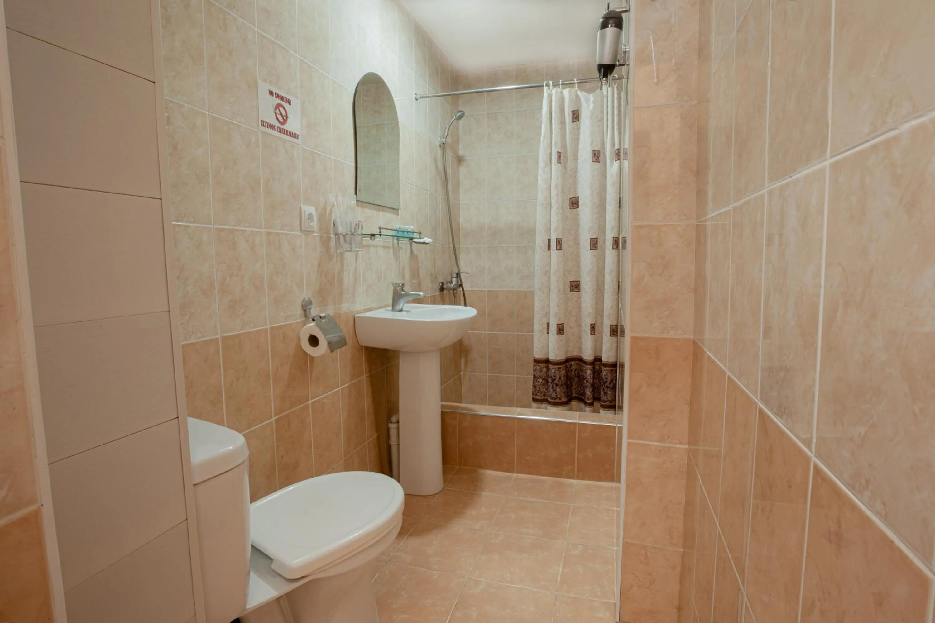 Toilet in Rohat Hotel Chilonzor