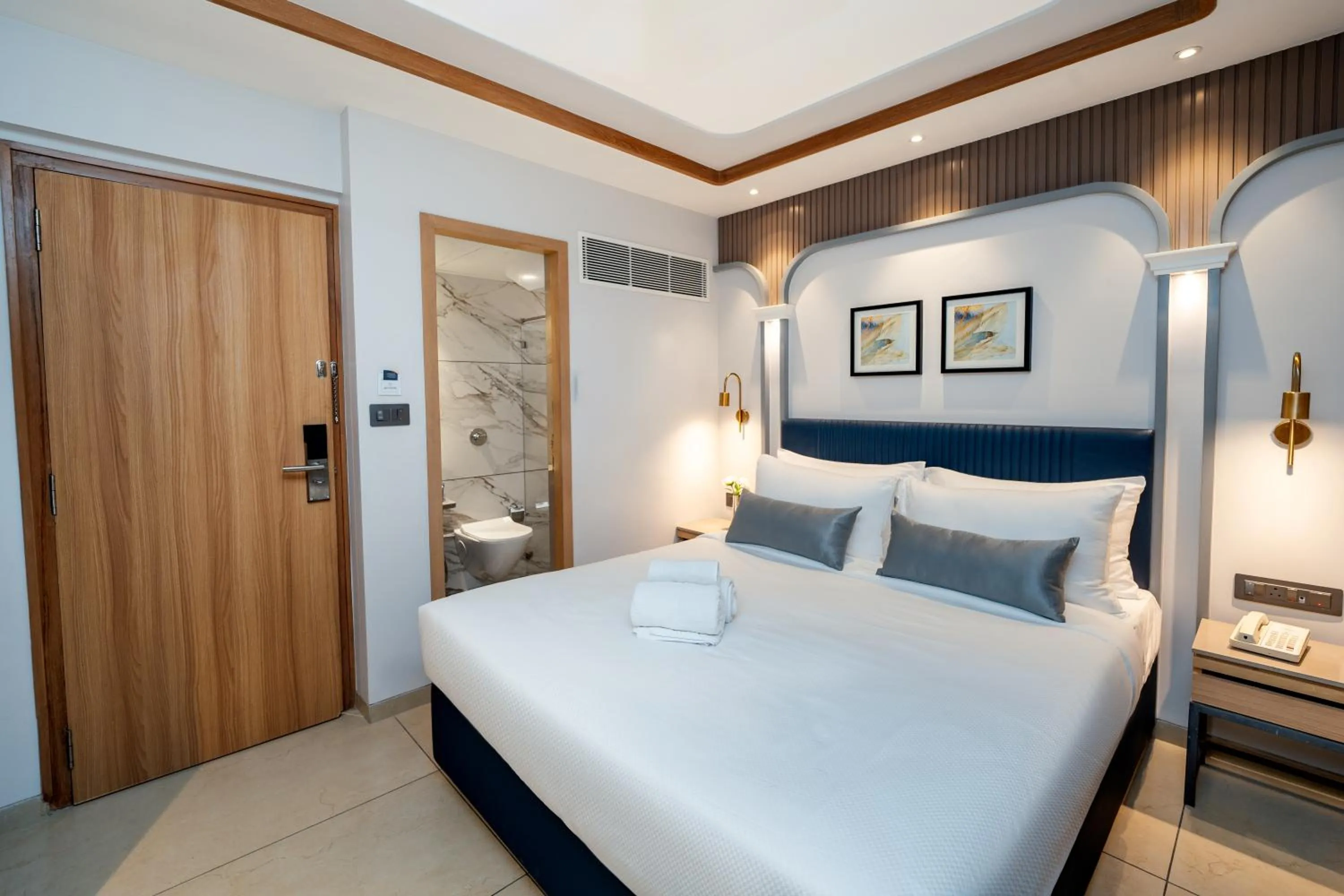 Bed in Ajanta Continental-Mumbai Airport