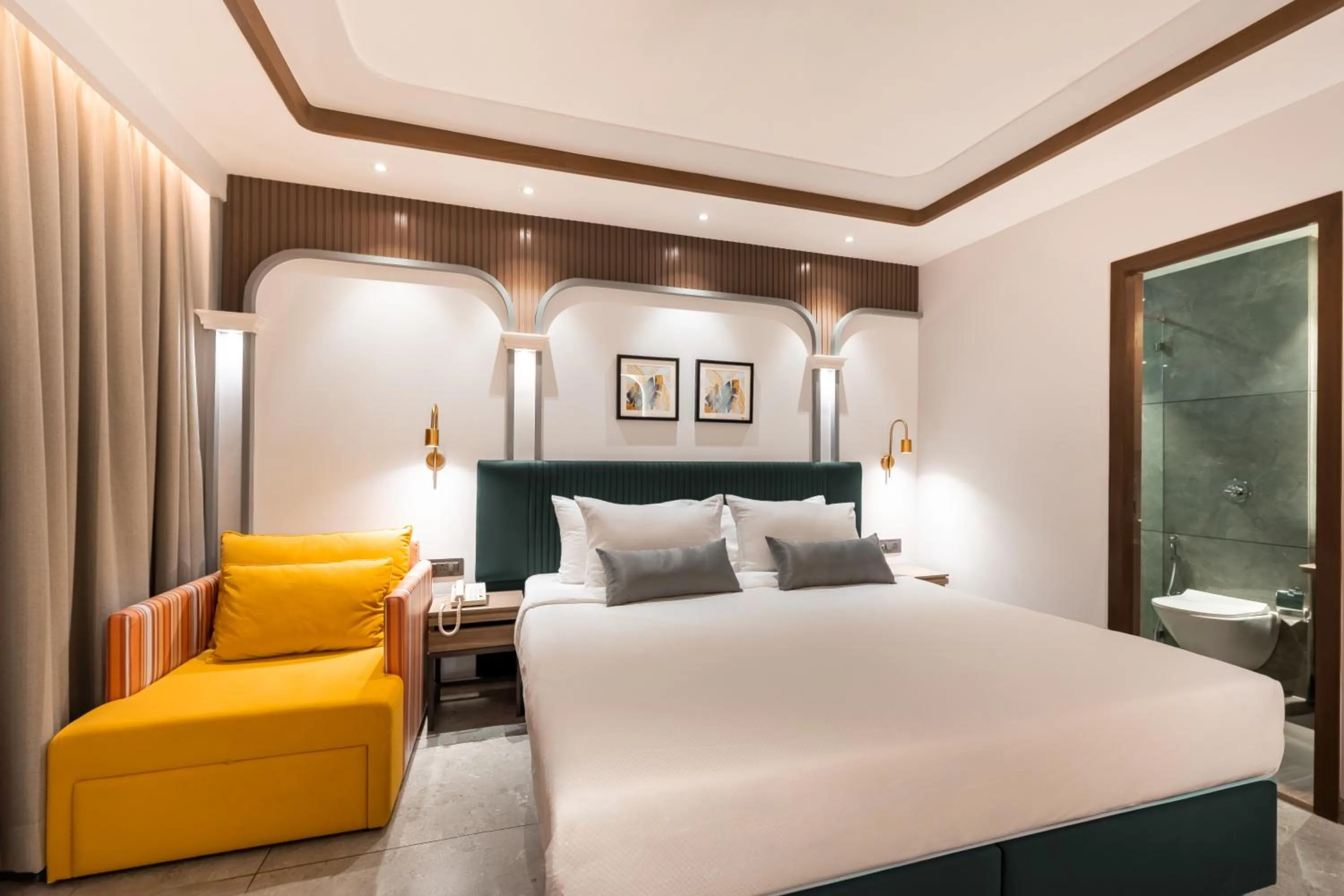 Bed in Ajanta Continental-Mumbai Airport