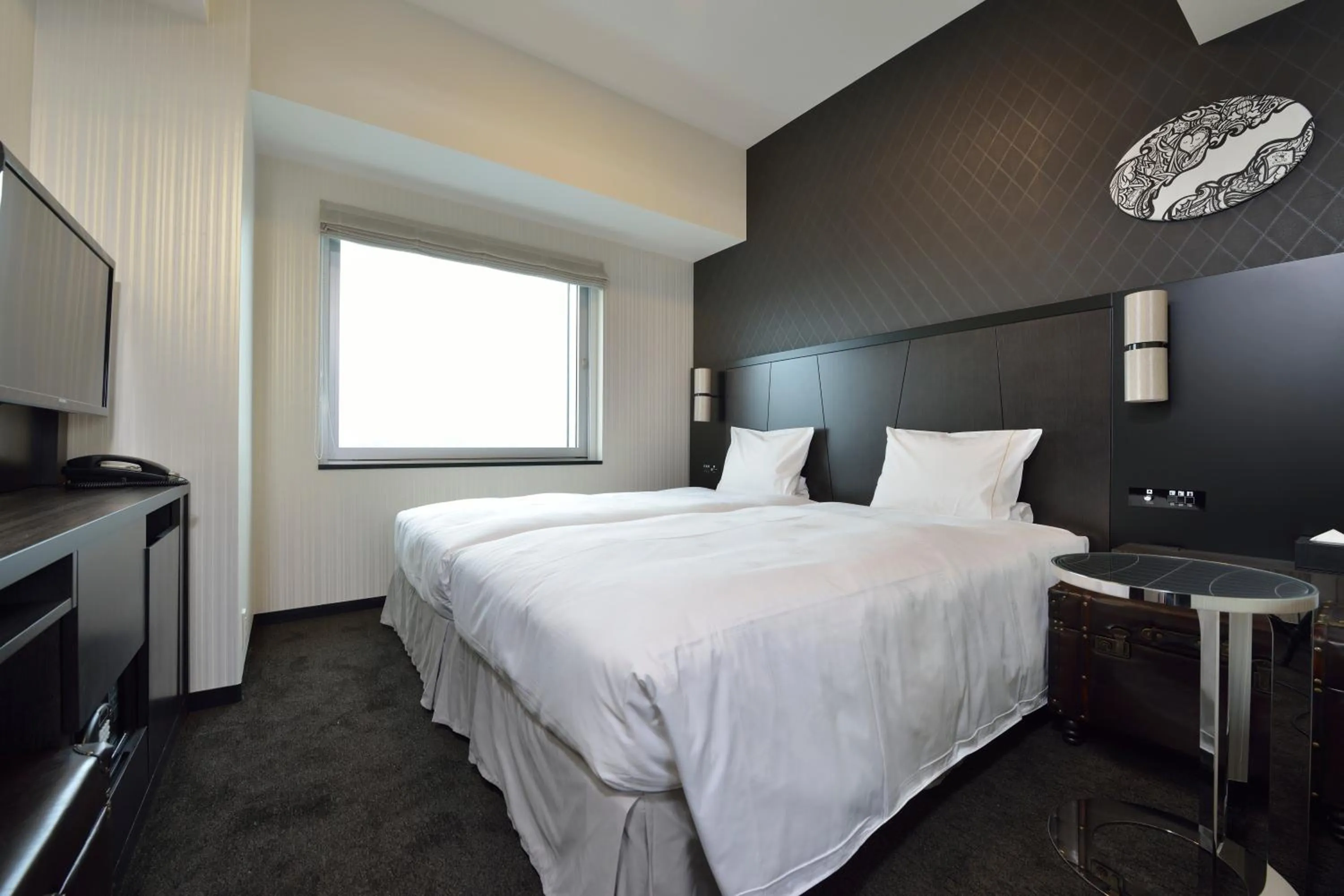 Bed in The Royal Park Hotel Tokyo Haneda Airport Terminal 3