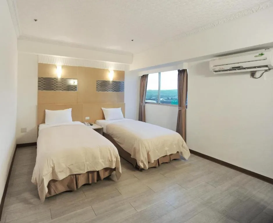 Bed in Kenting Holiday Hotel- Pet-friendly